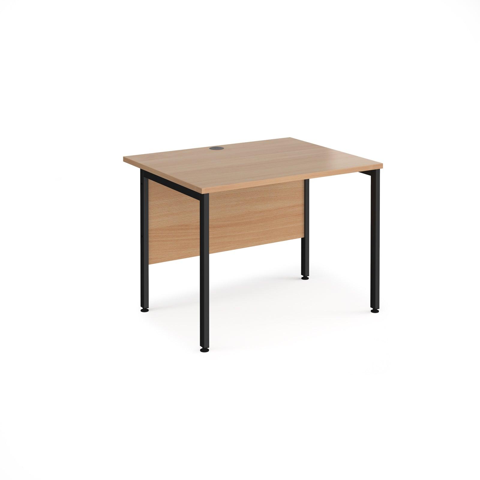 a desk with a wooden top and black legs