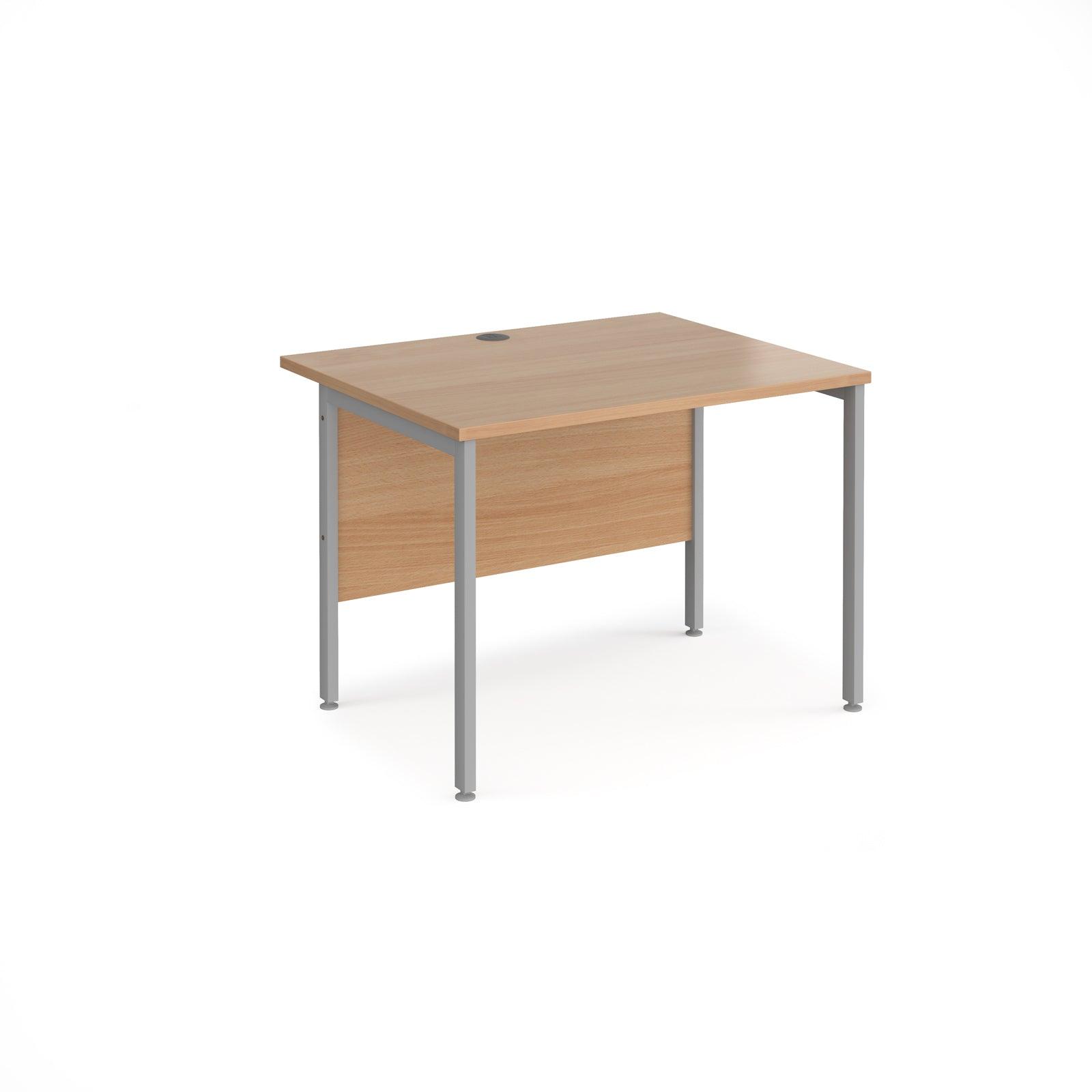 a desk with a wooden top and metal legs