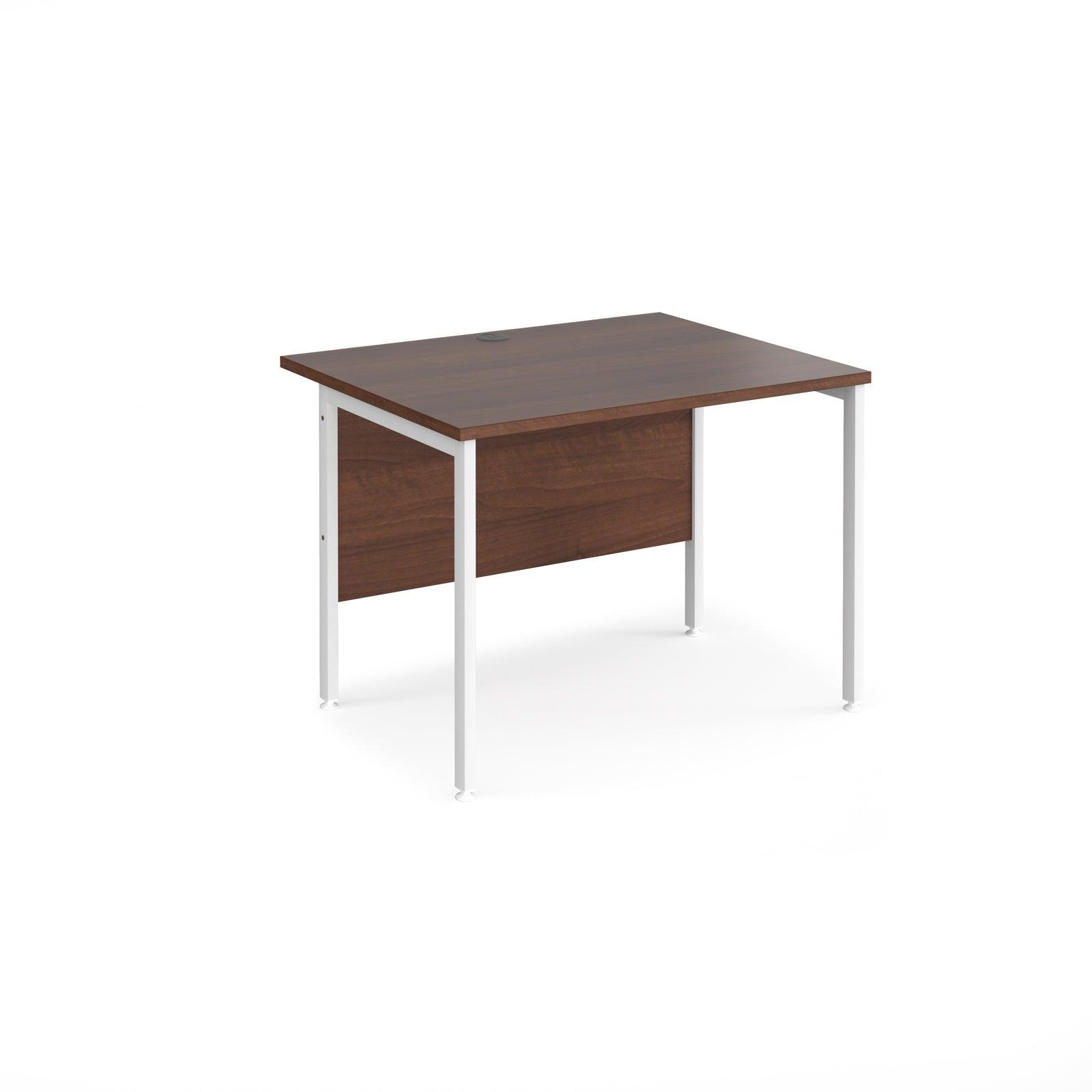 a desk with a wooden top and white legs