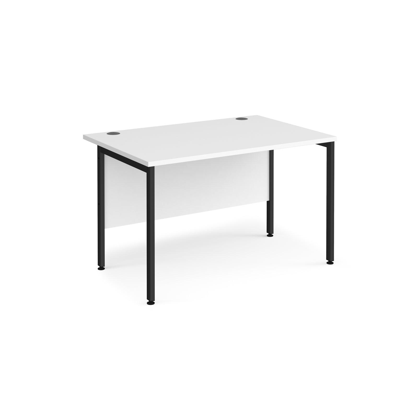 a white desk with black legs on a white background