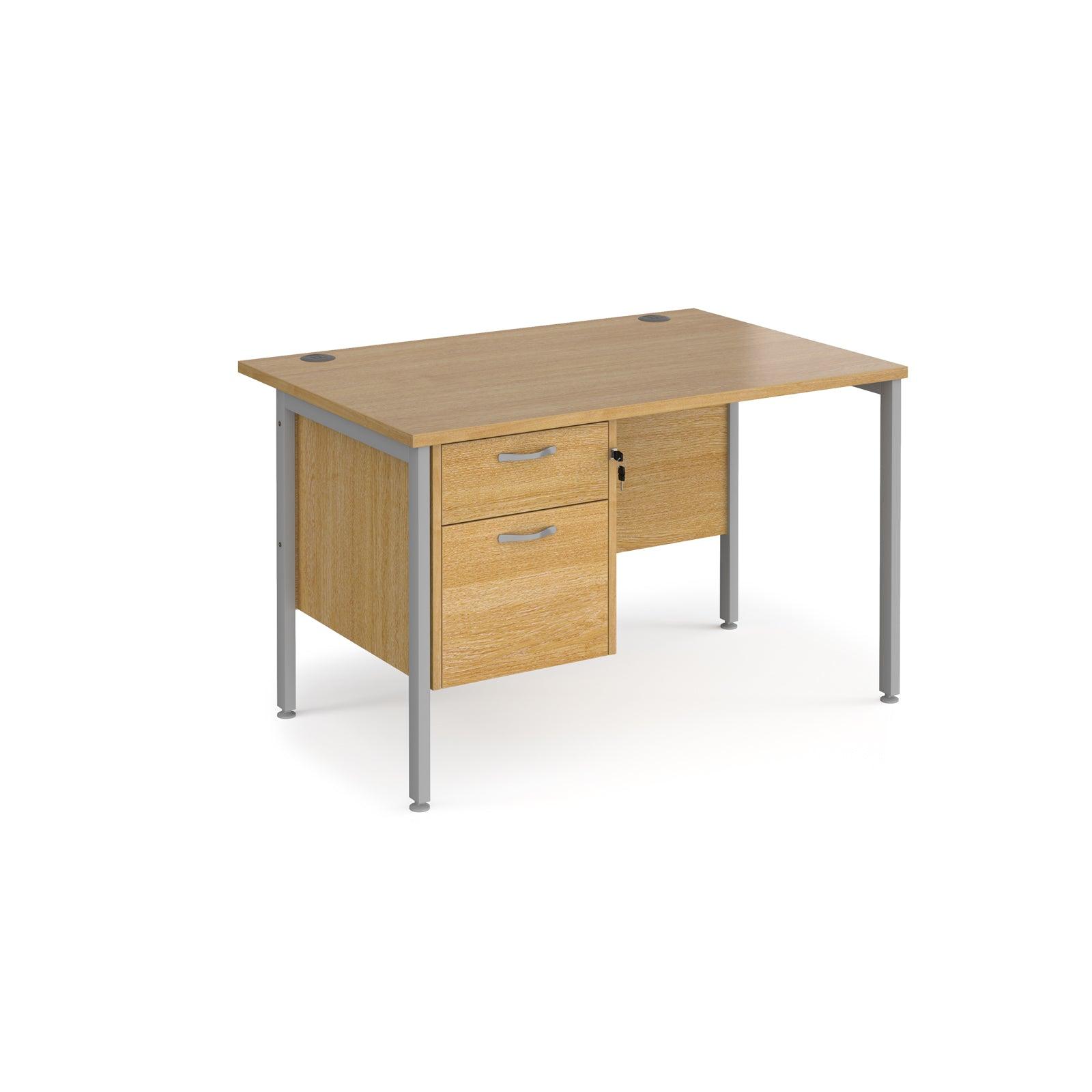 a wooden desk with two drawers and a metal frame