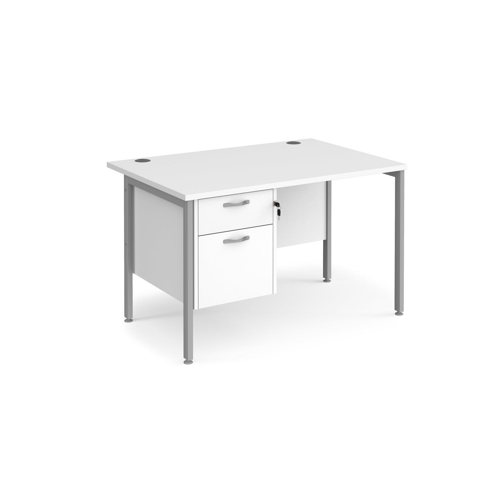 a white desk with a drawer underneath it