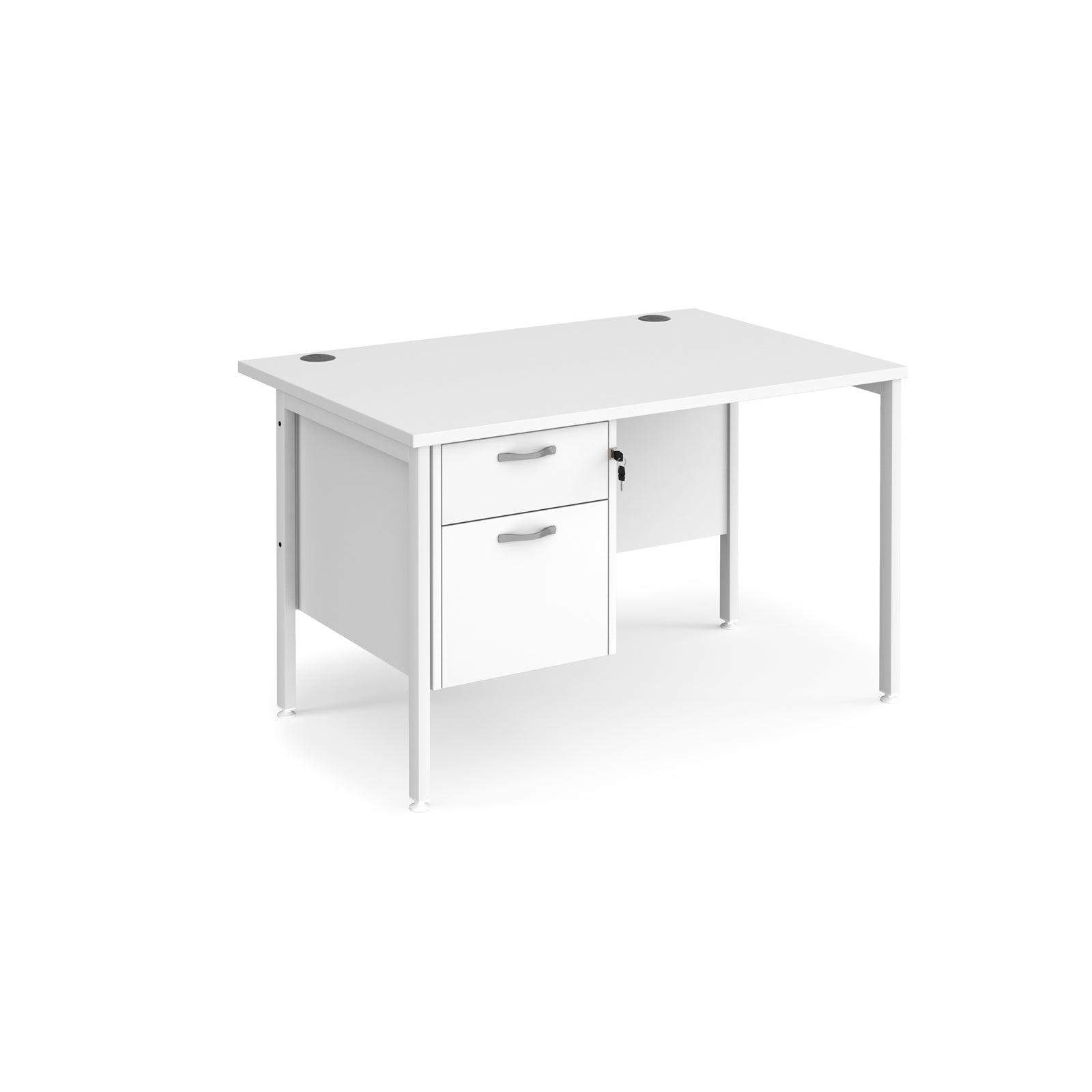 a white desk with a drawer underneath it