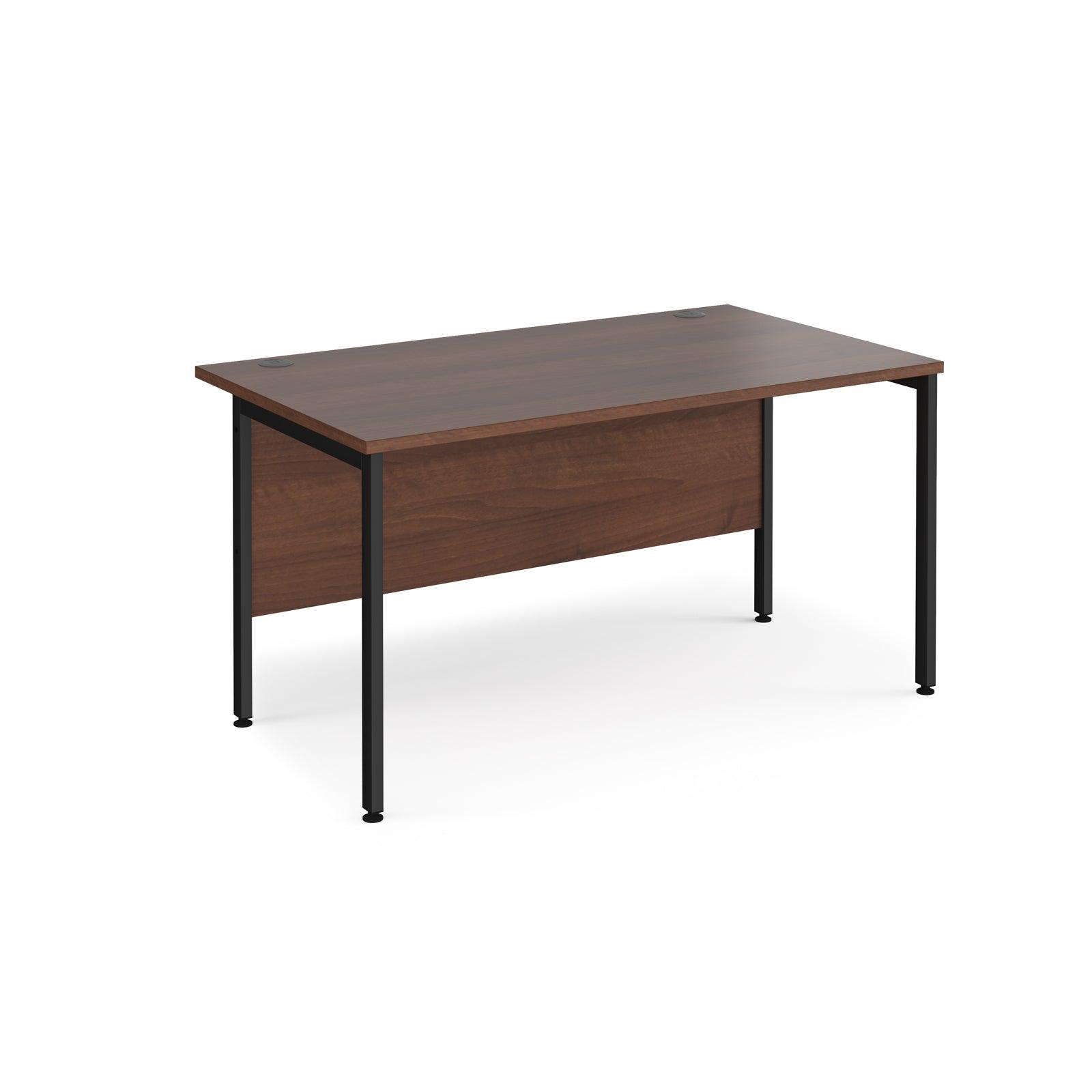 a desk with a wooden top and black legs