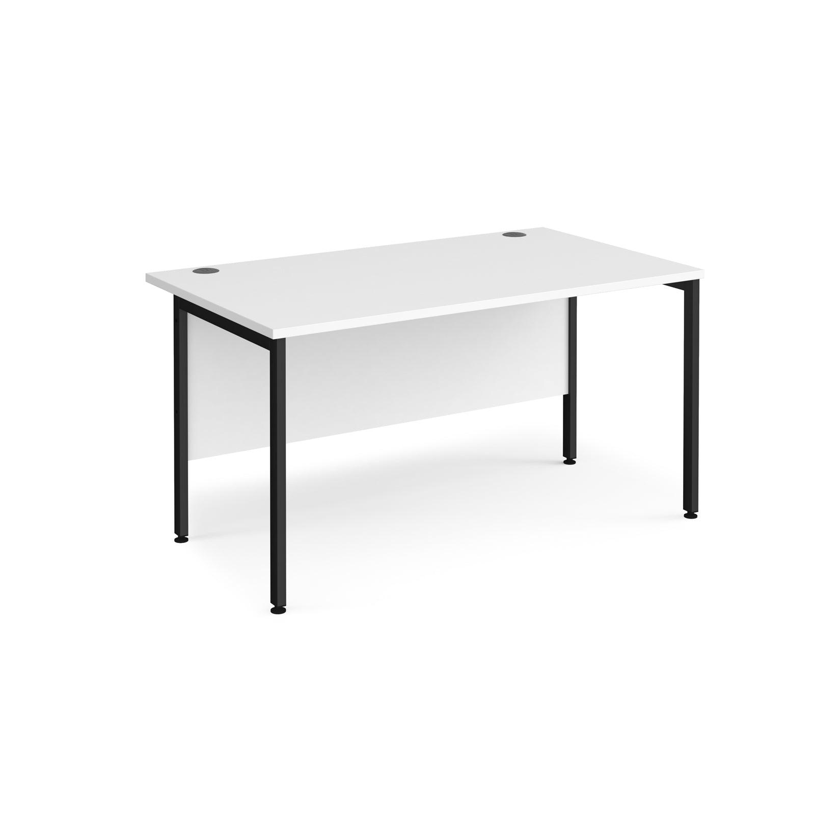 a white desk with black legs on a white background