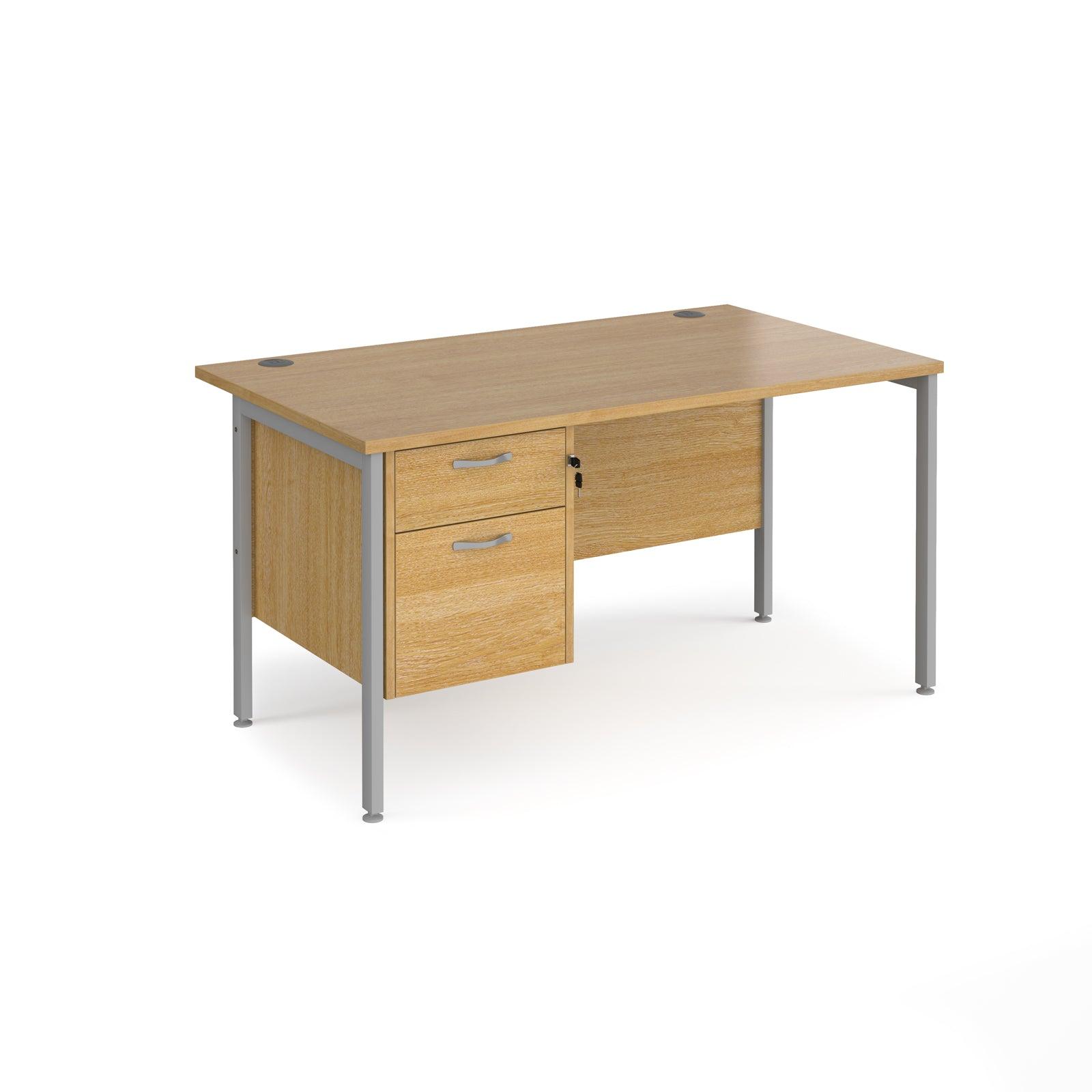 a wooden desk with two drawers and a metal frame