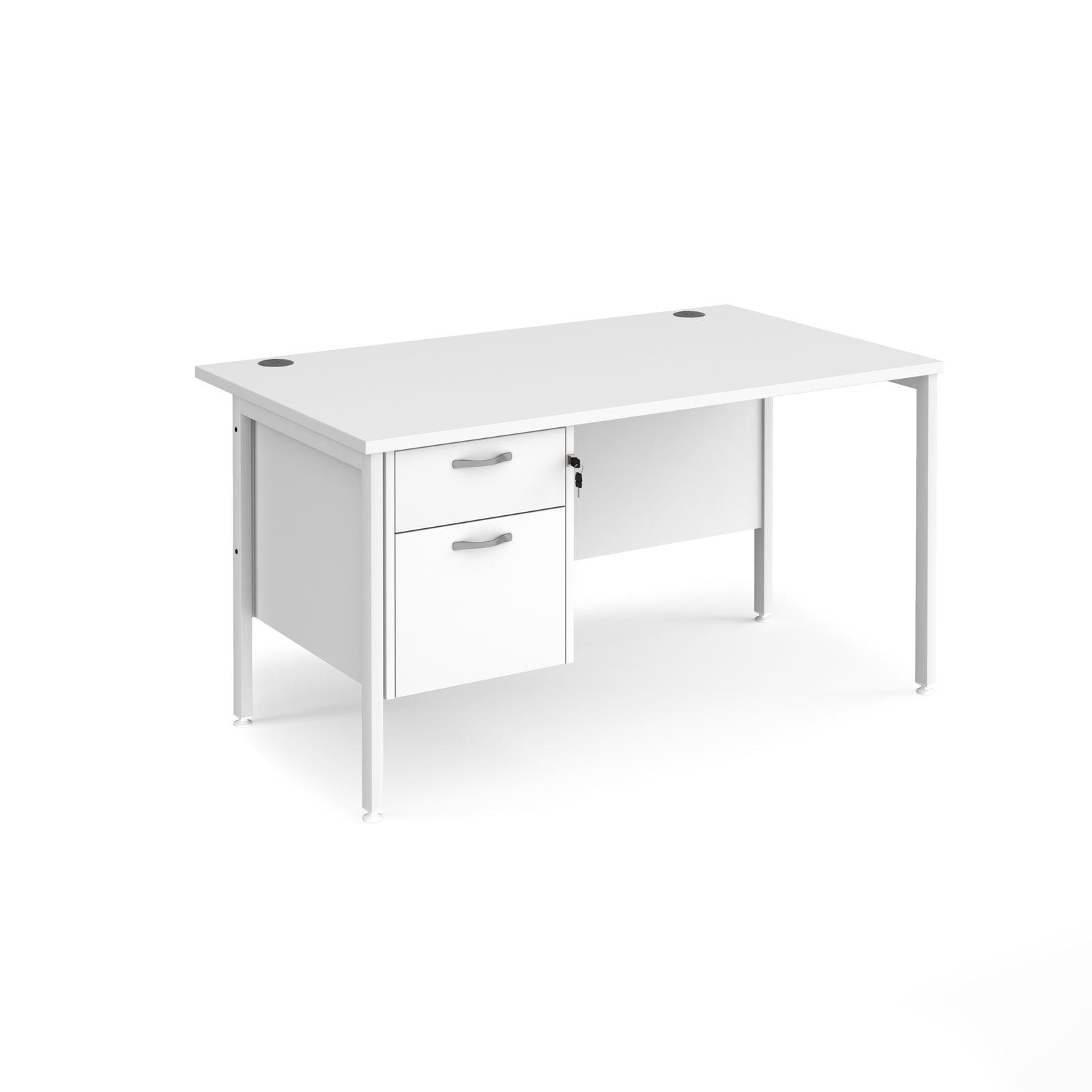 a white desk with a drawer underneath it