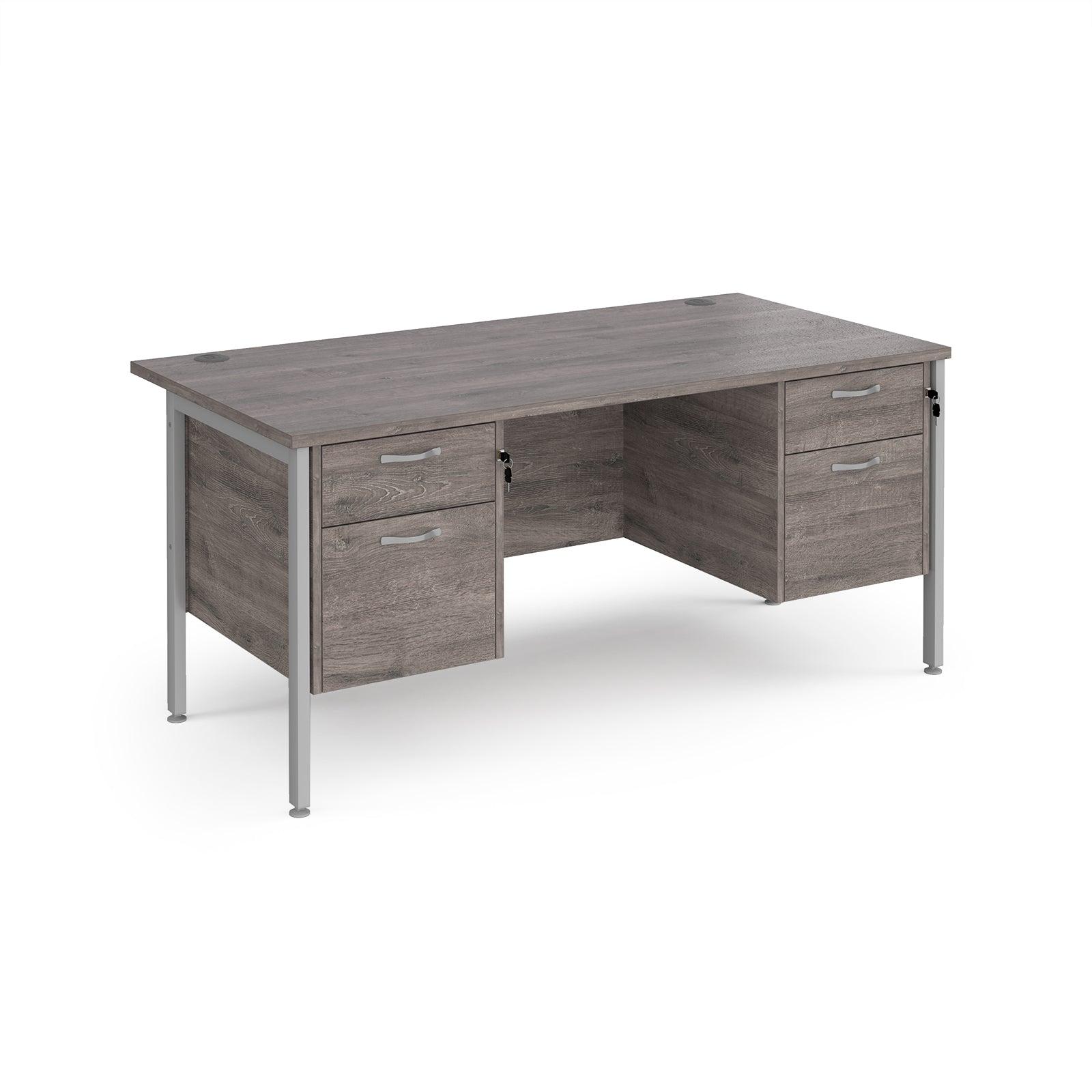 a desk with two drawers and a metal frame