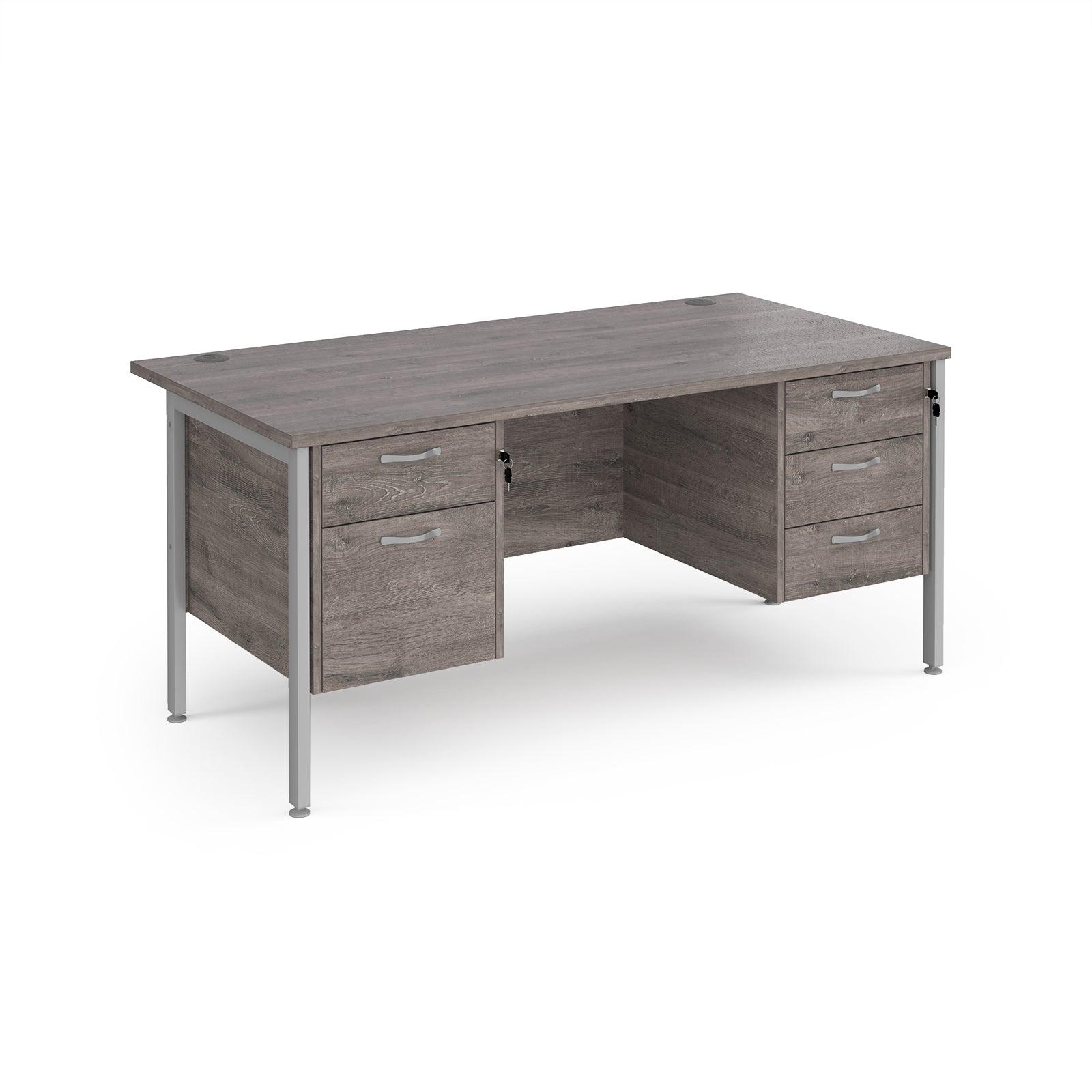 a desk with two drawers and a metal frame