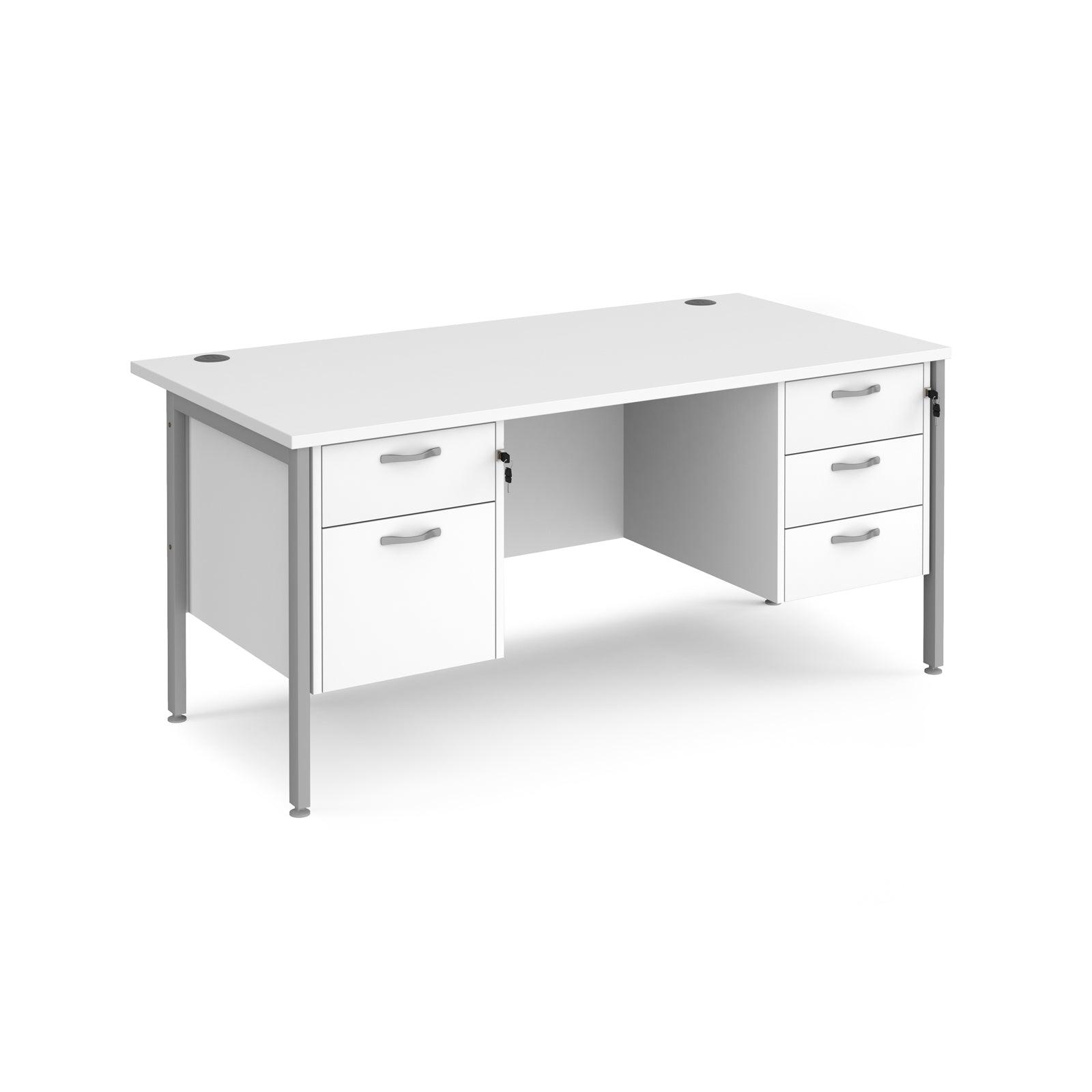 a white desk with two drawers on top of it