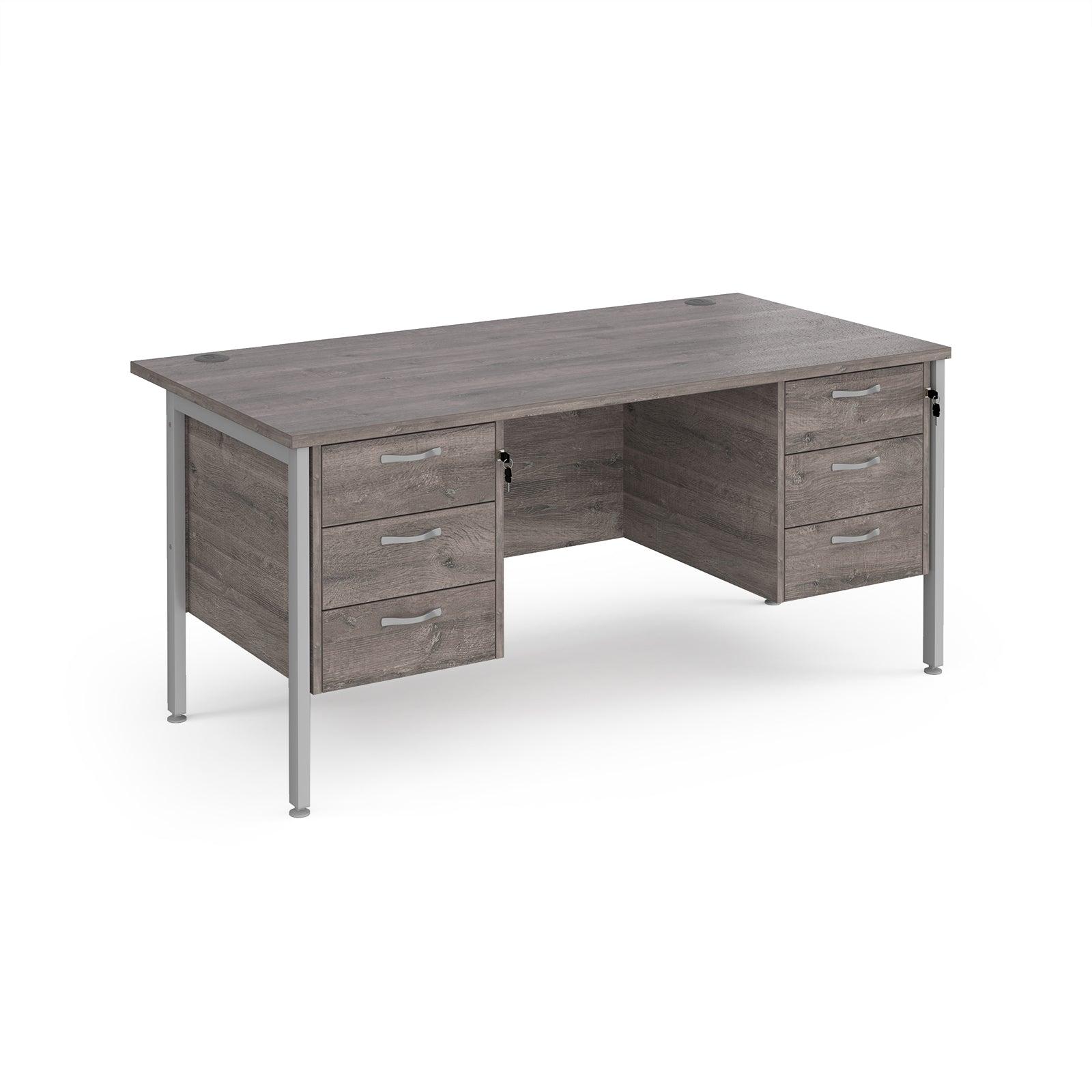 an office desk with three drawers and a metal frame