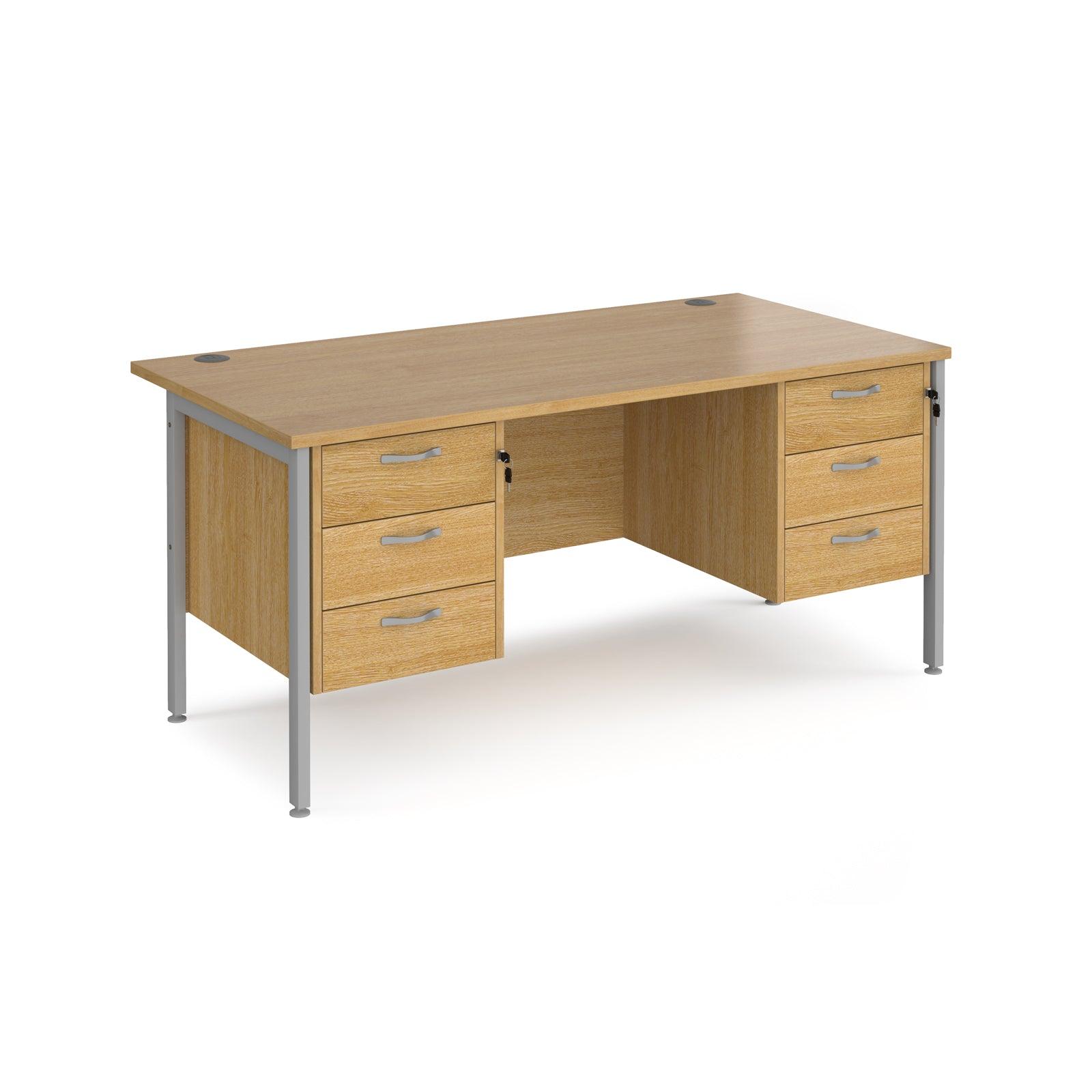 a wooden desk with two drawers and a metal frame