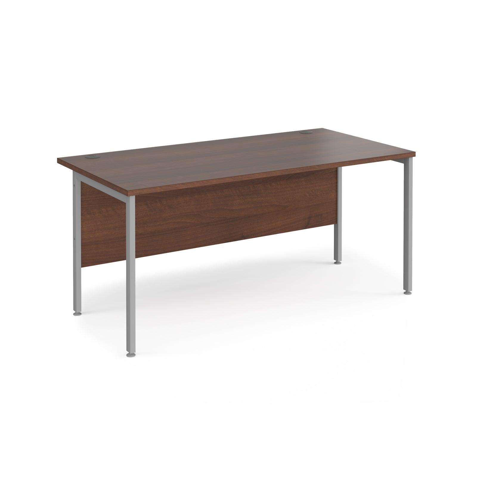 a desk with a wooden top and metal legs