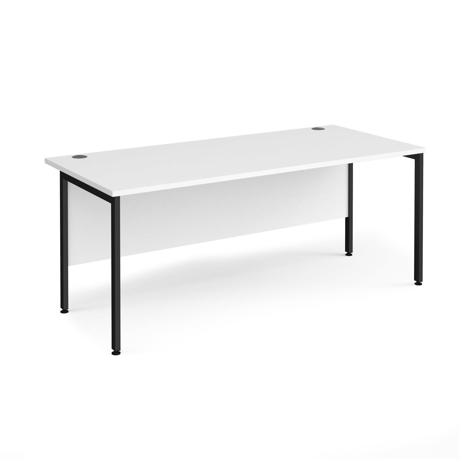 a white desk with black legs on a white background