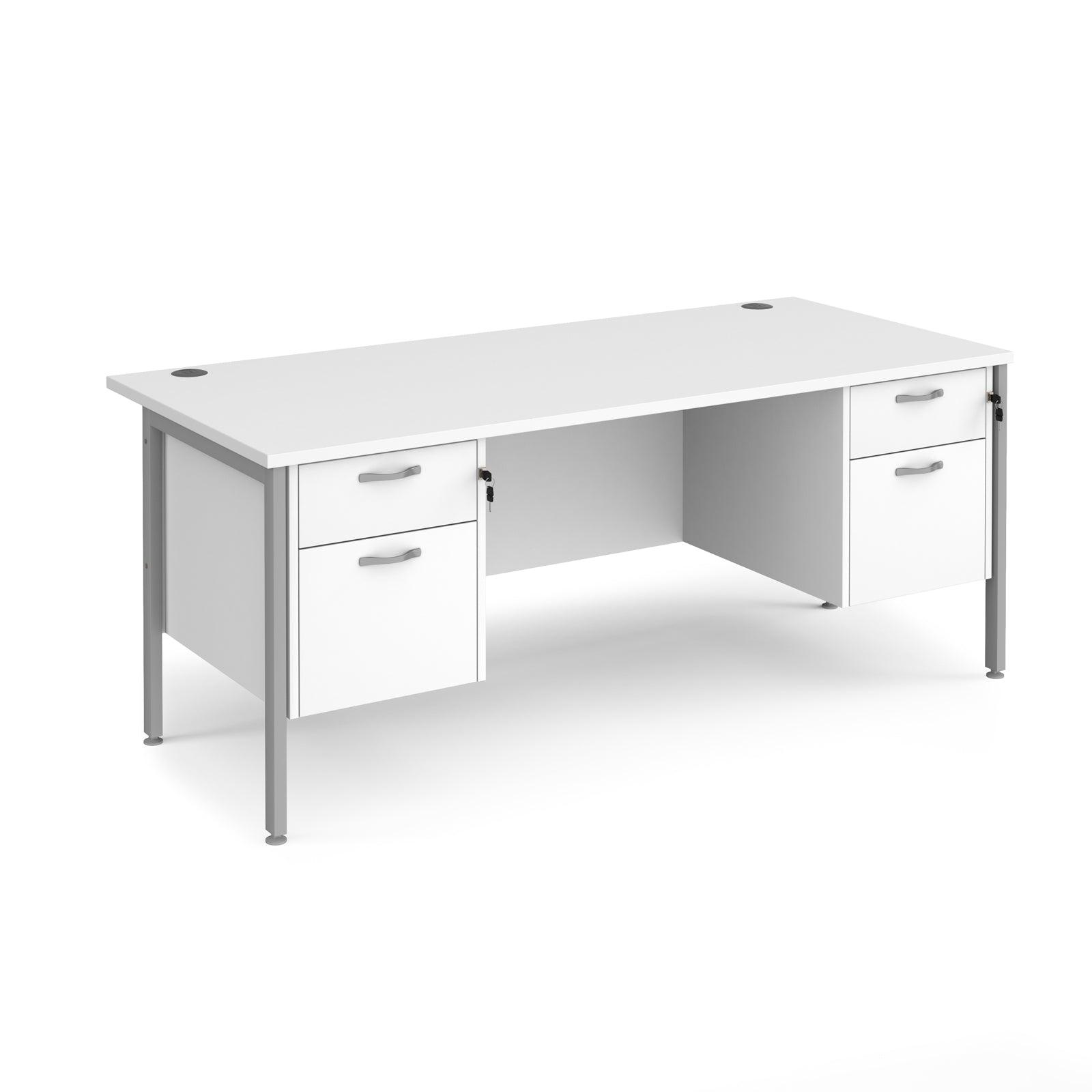 a white desk with two drawers on top of it