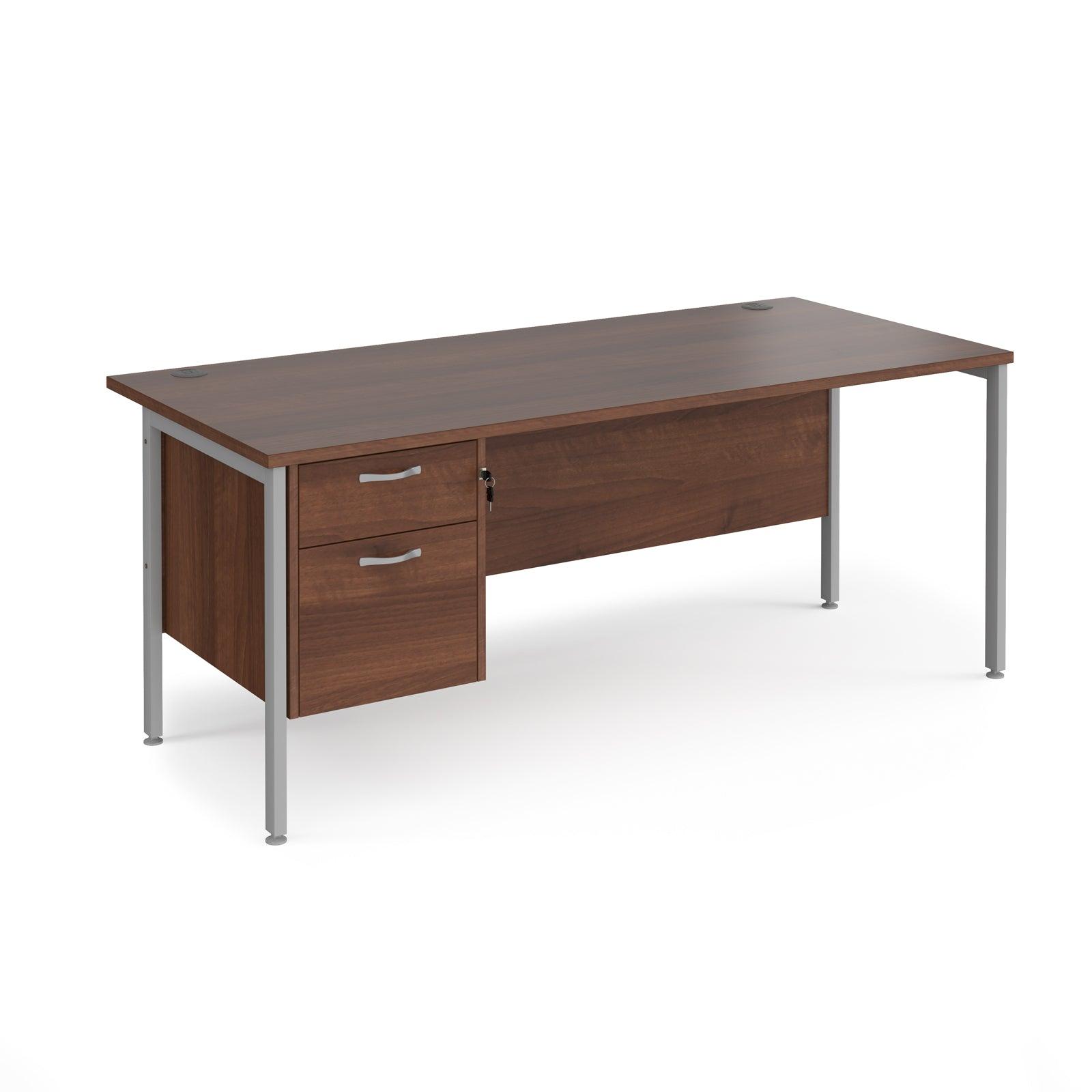 a desk with two drawers and a metal leg