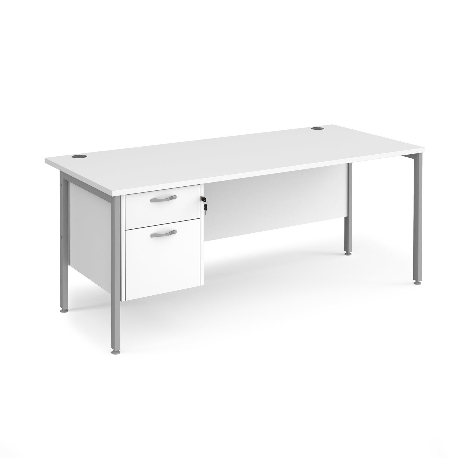 a white desk with two drawers on top of it