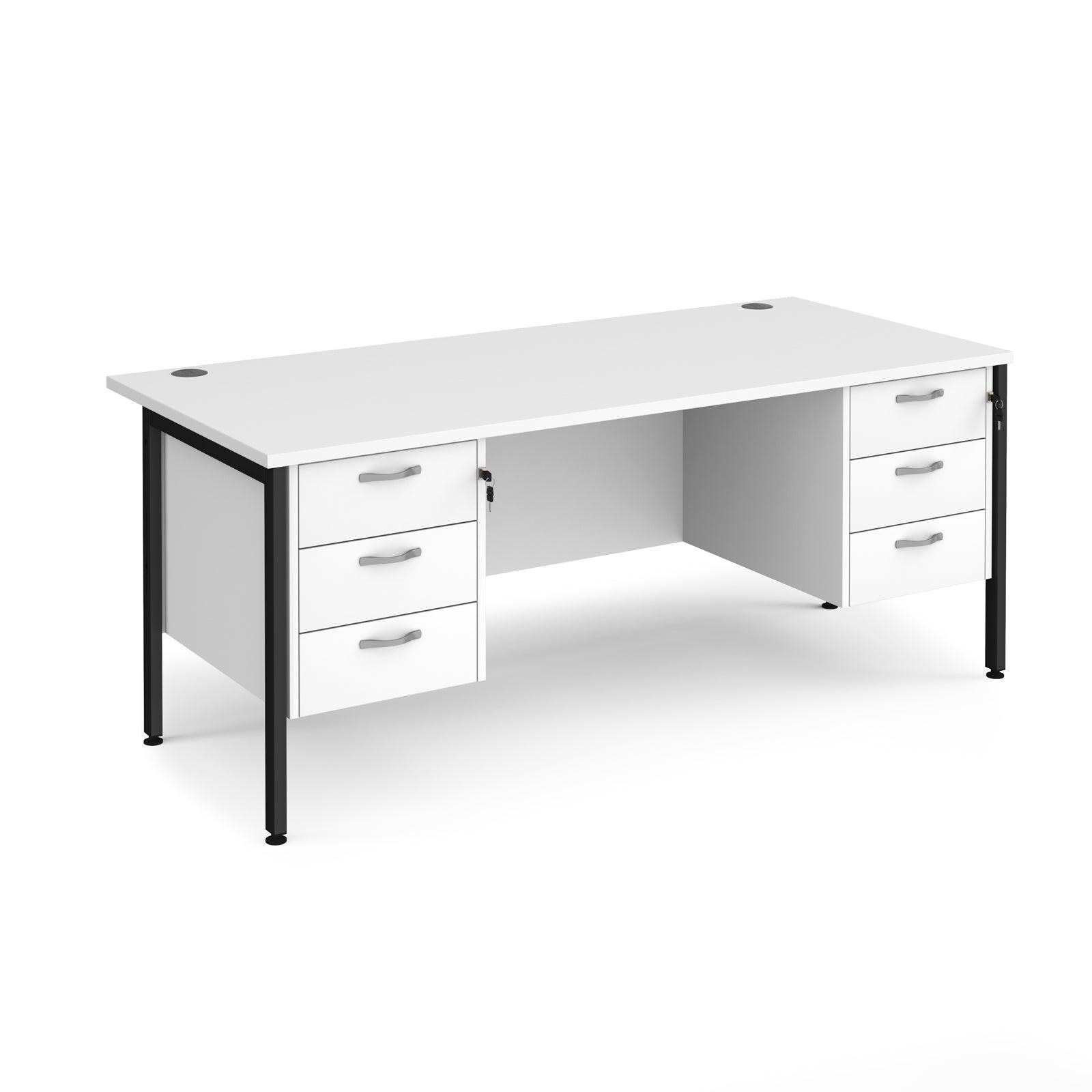 a white desk with three drawers and a black frame