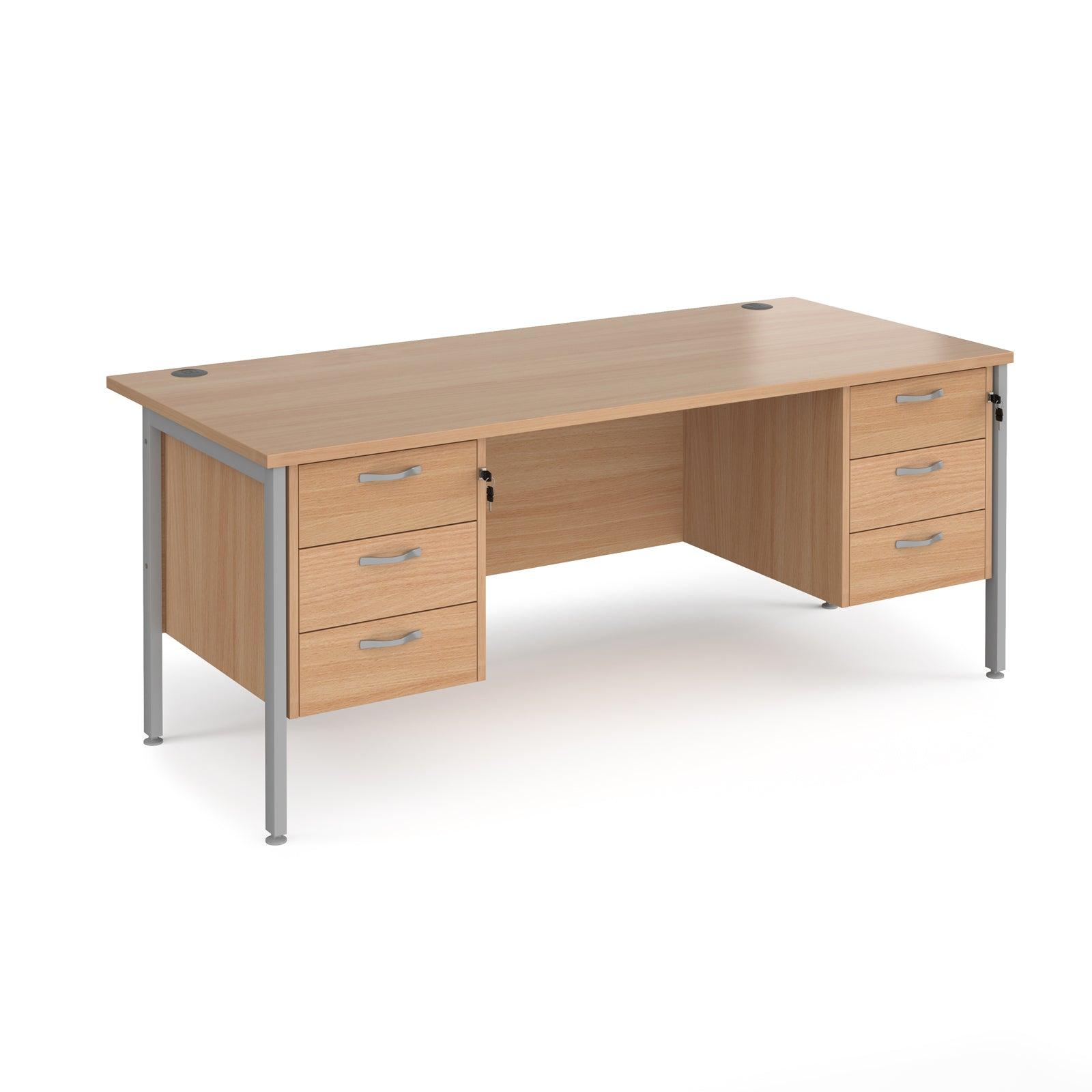 a wooden desk with two drawers and a metal frame