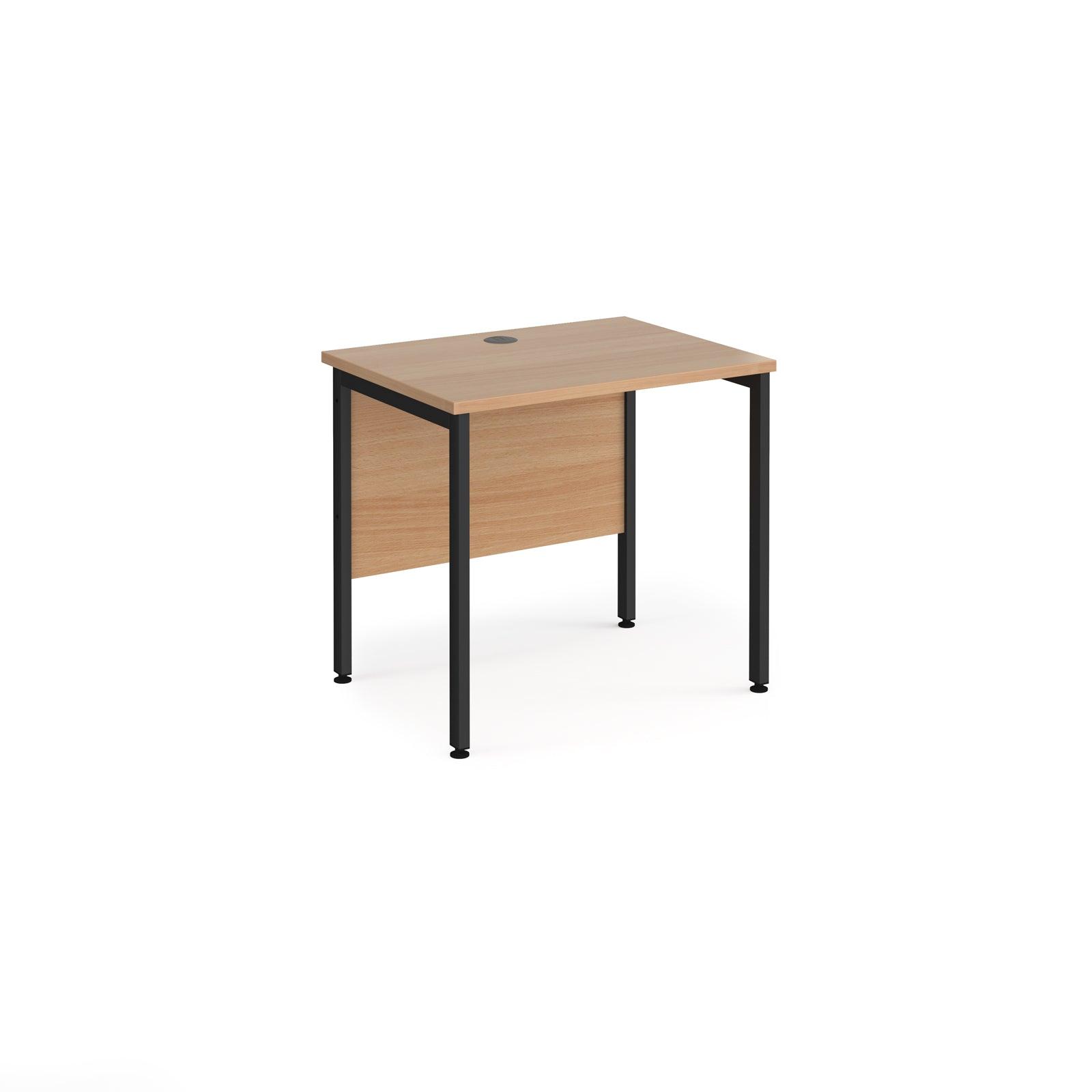 a desk with a wooden top and black legs