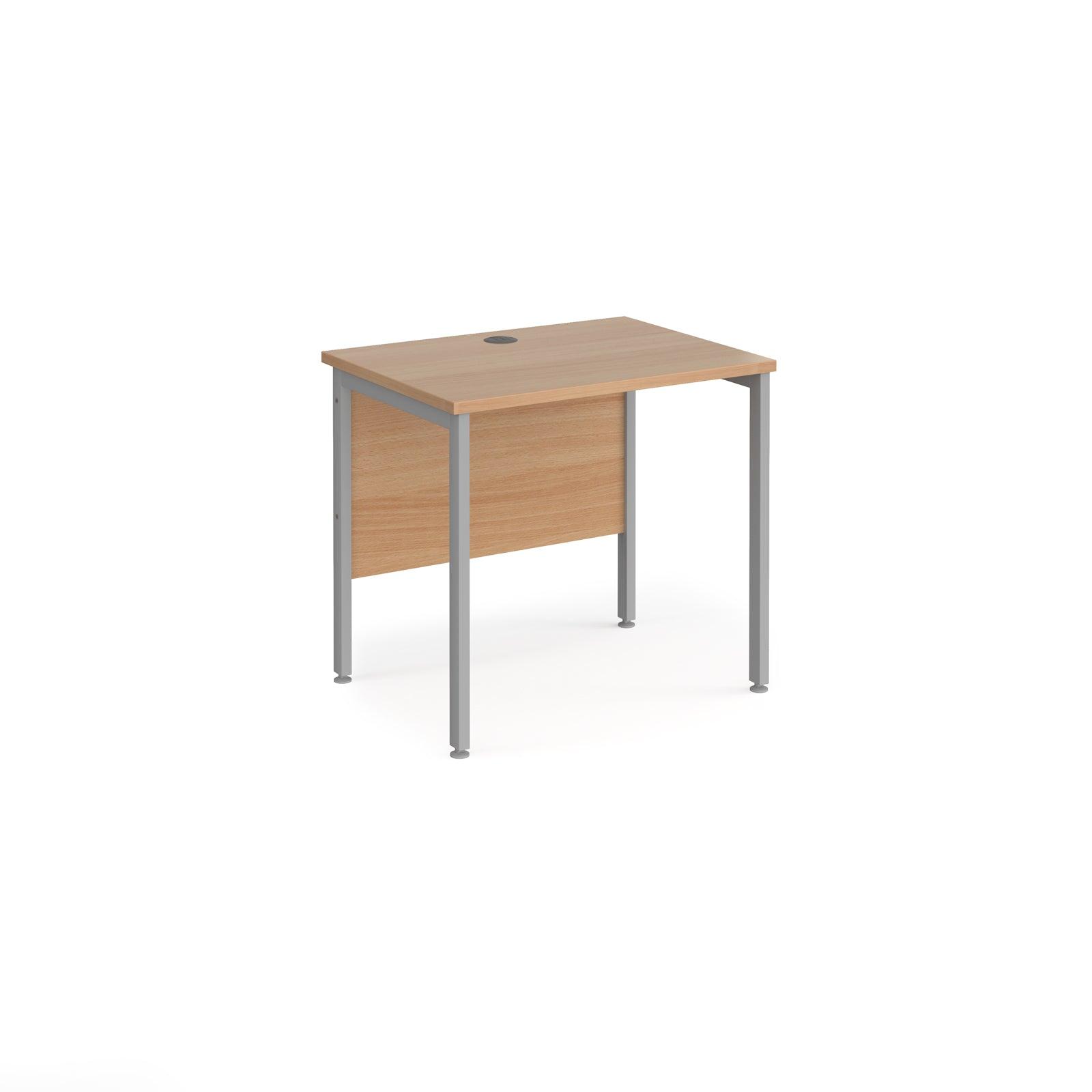 a desk with a wooden top and metal legs