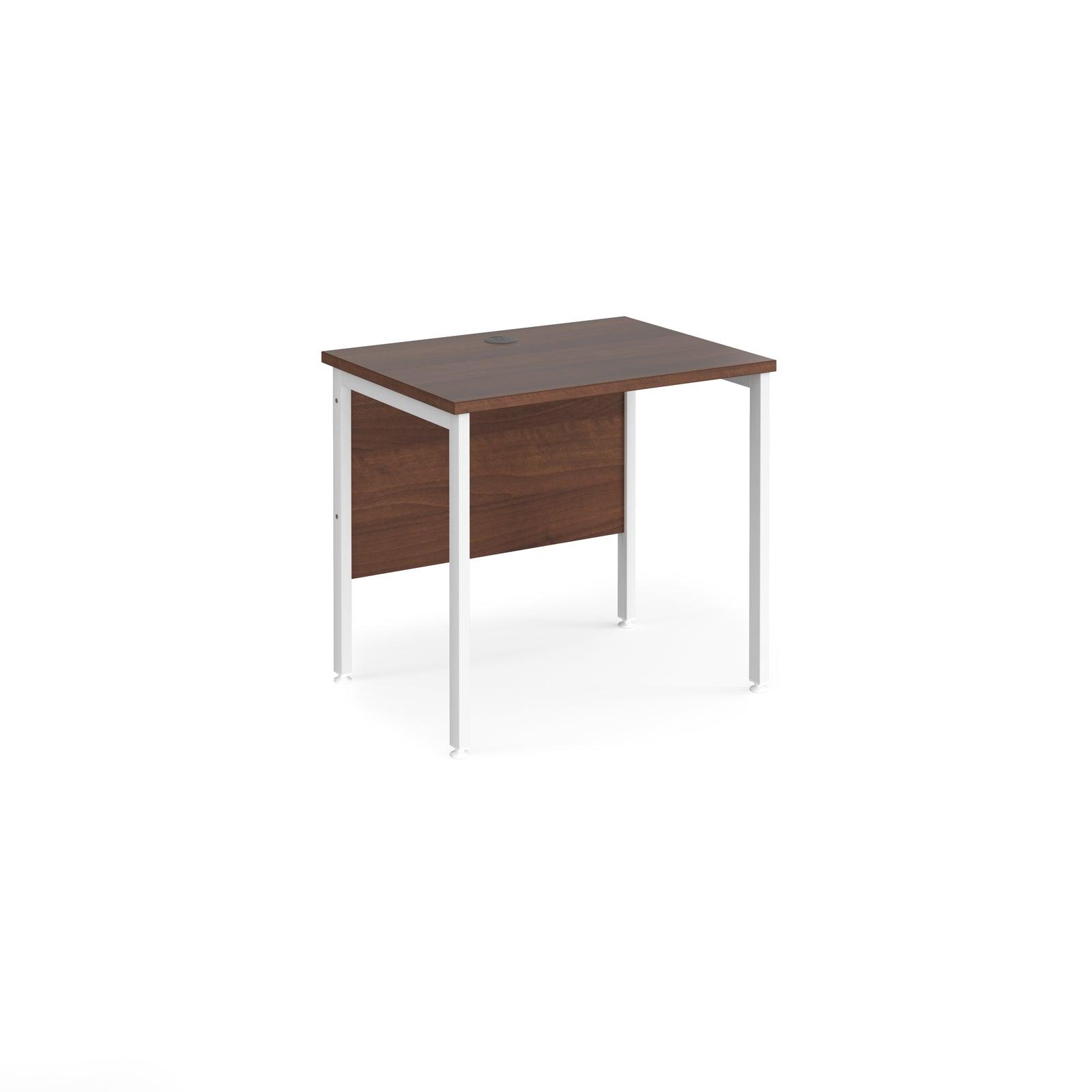 a desk with a wooden top and white legs