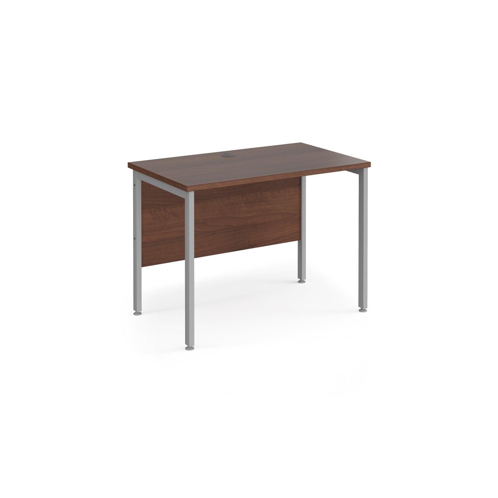 a desk with a wooden top and metal legs