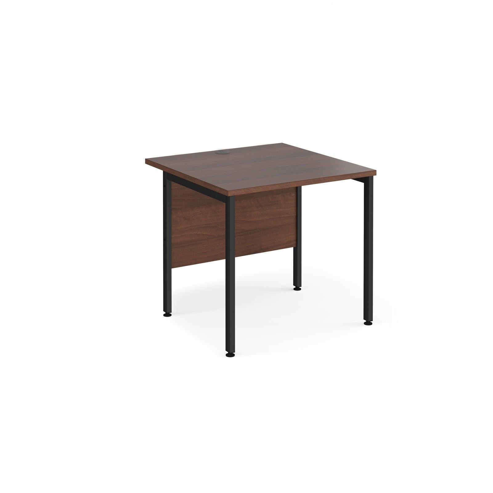 a desk with a wooden top and metal legs