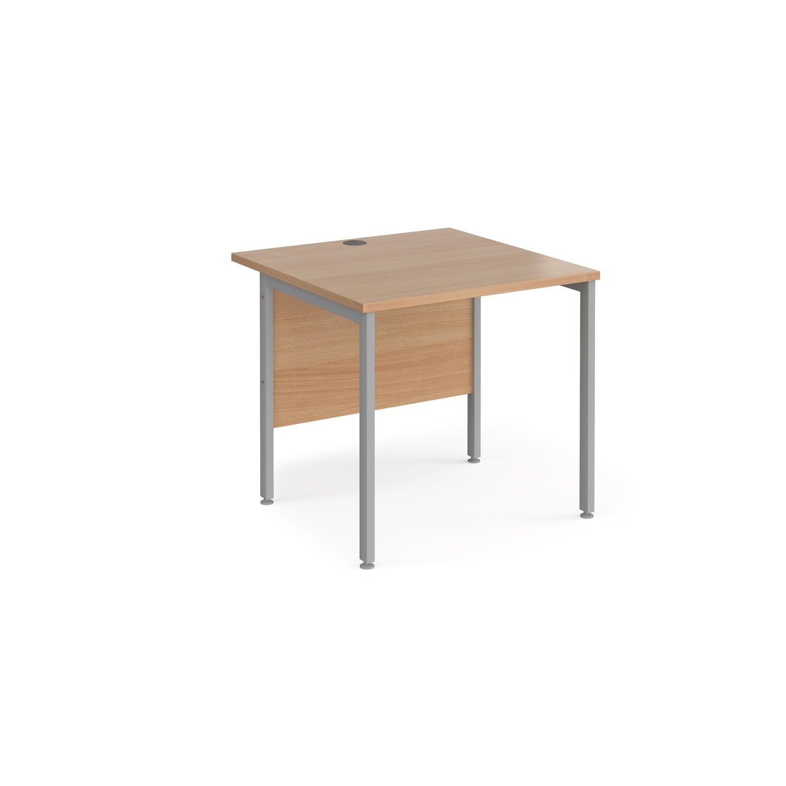 a desk with a wooden top and metal legs