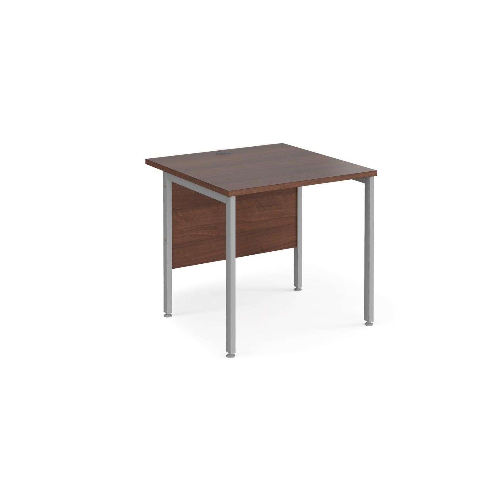 a desk with a wooden top and metal legs