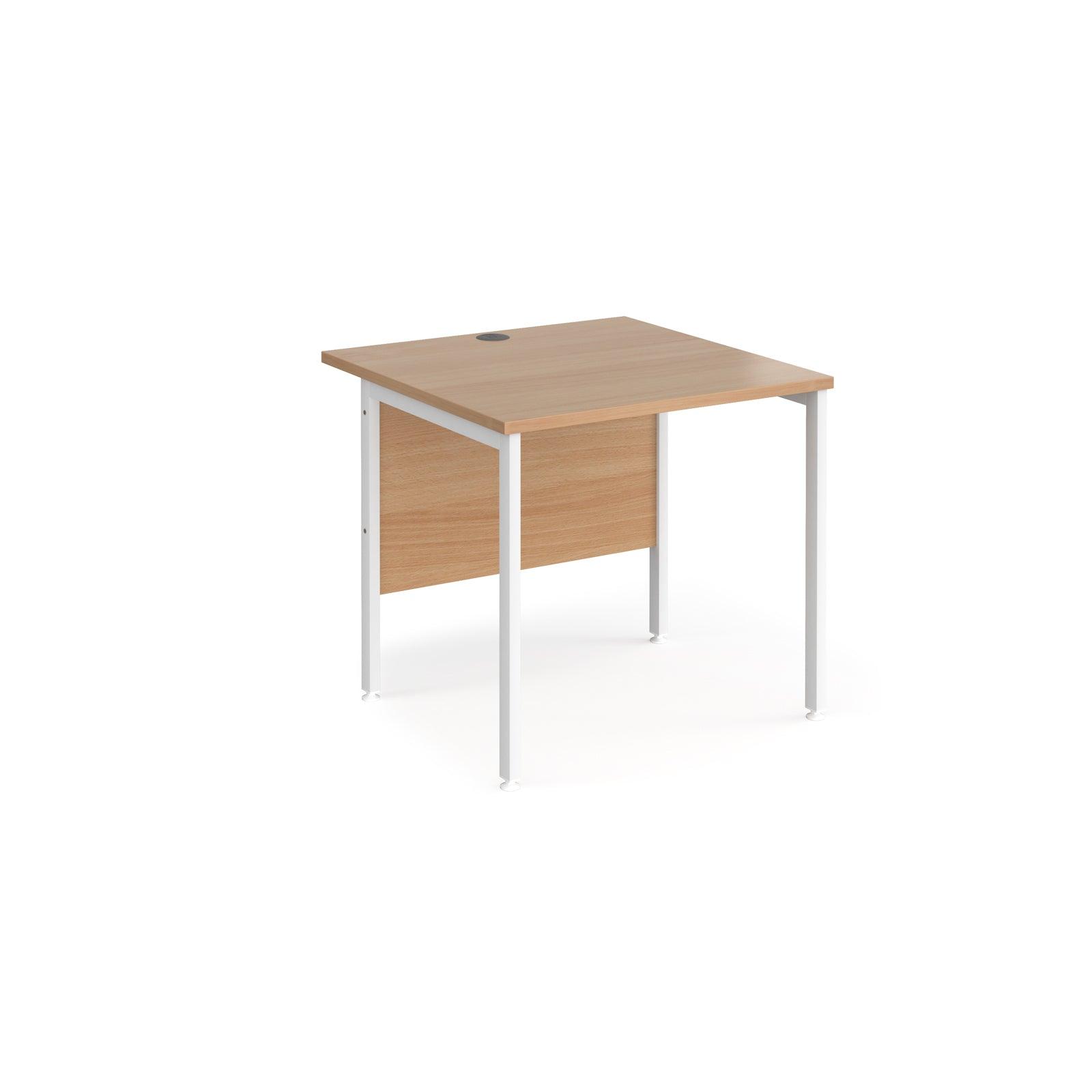 a desk with a wooden top and white legs