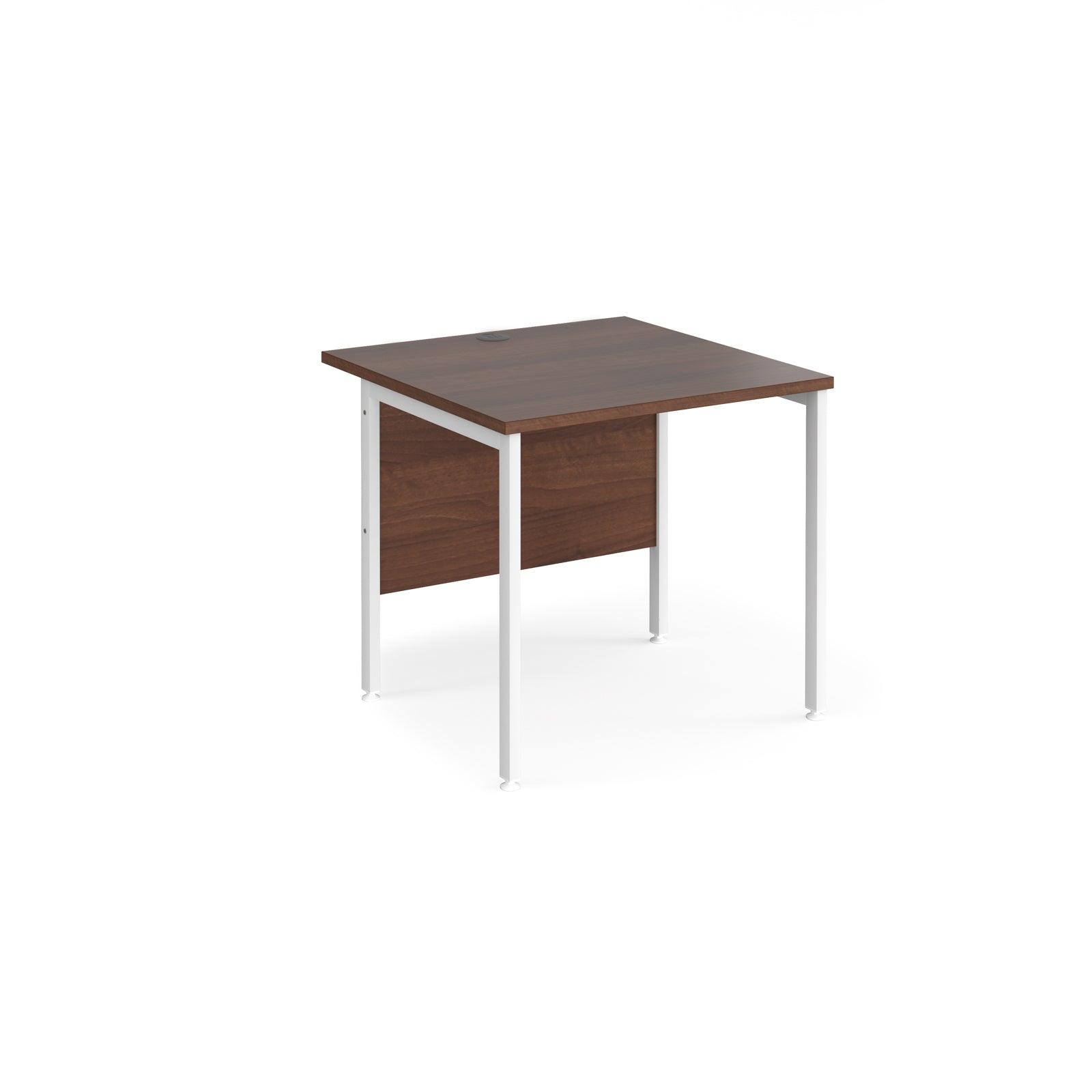 a desk with a wooden top and white legs