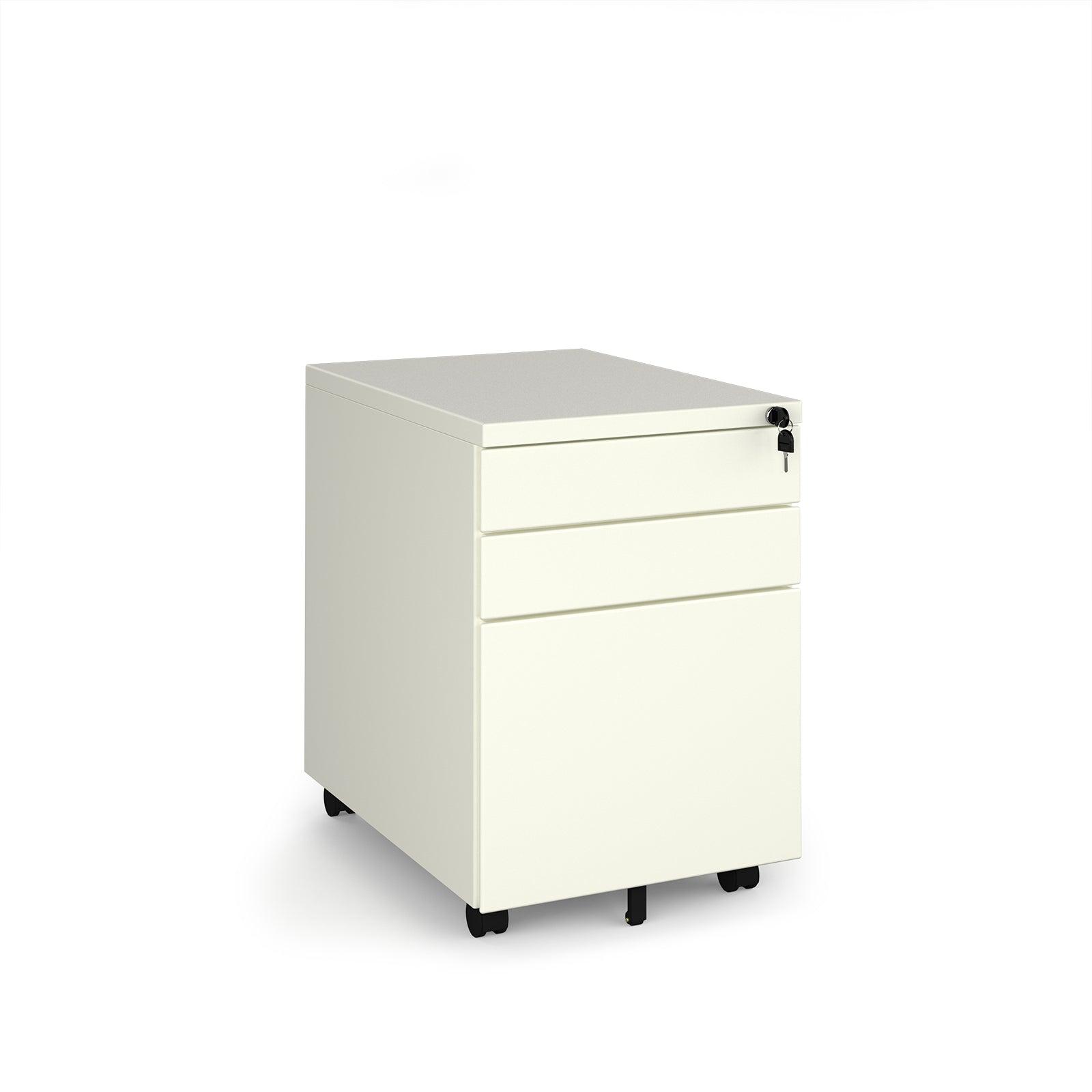 a white filing cabinet sitting on top of a white floor