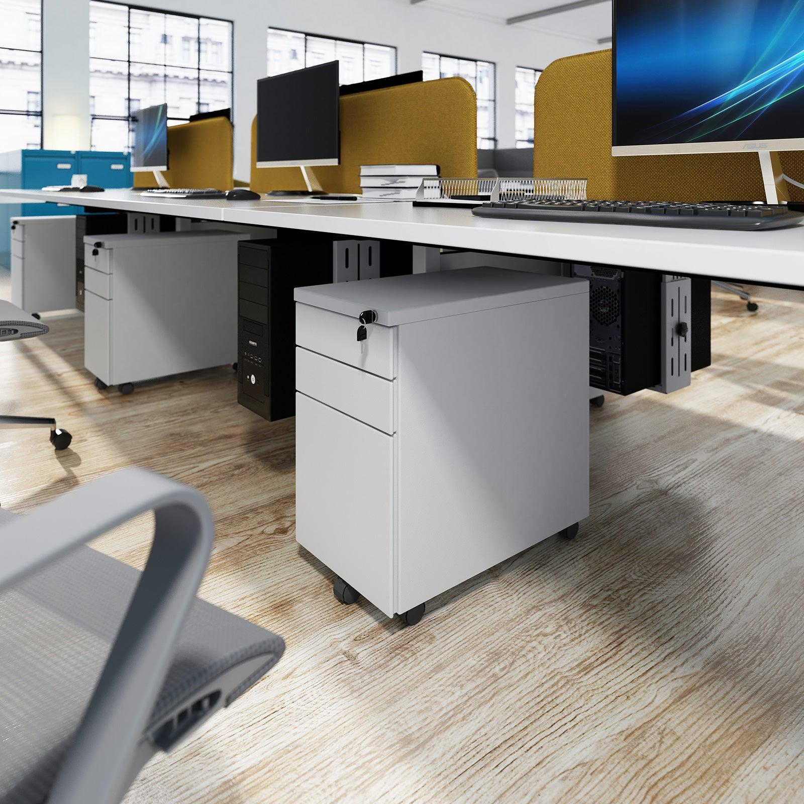 a desk with a computer monitor and a keyboard on it