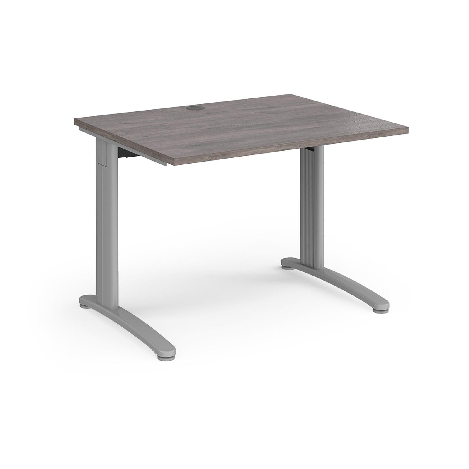 a desk with a wooden top and metal legs