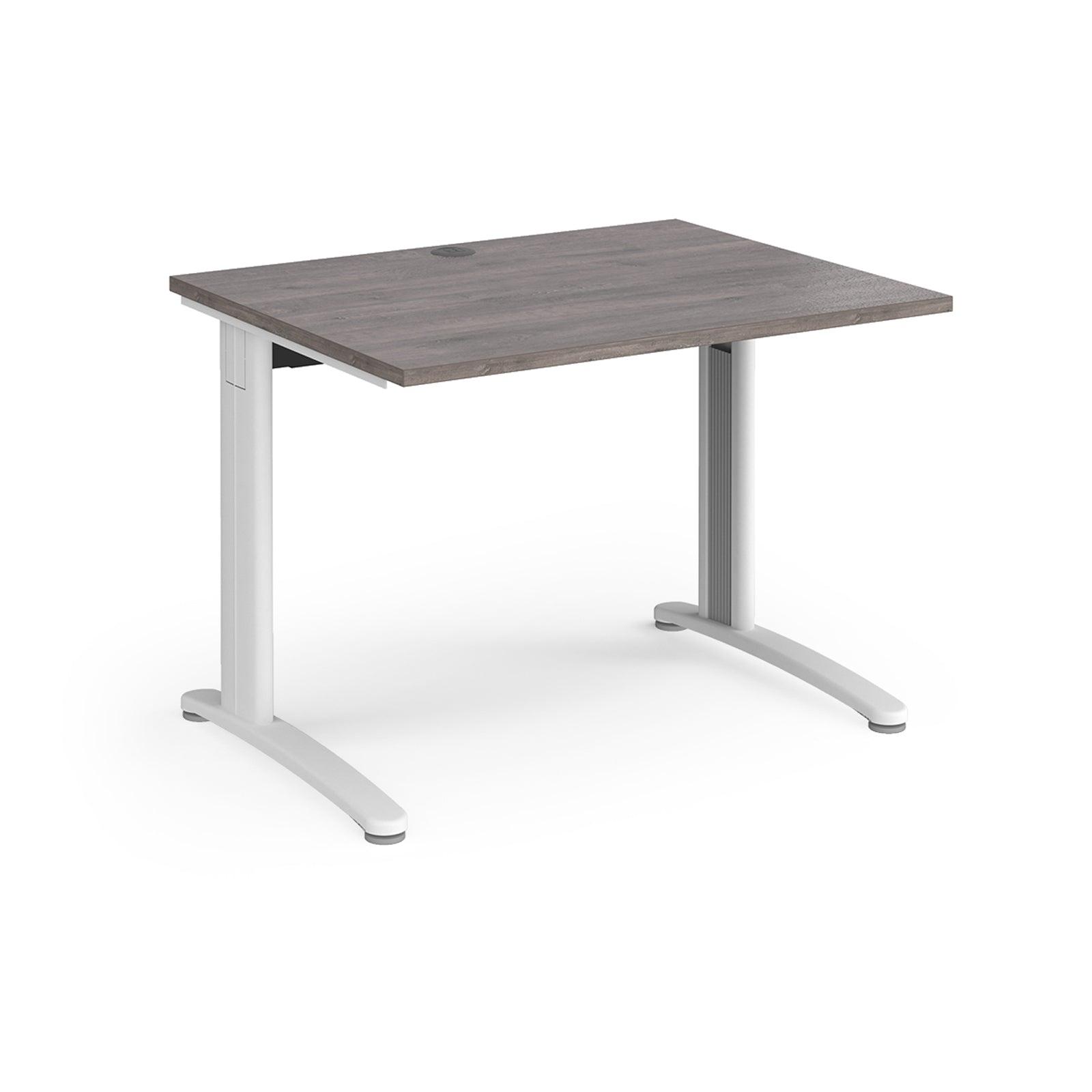 a desk with a wooden top and white legs