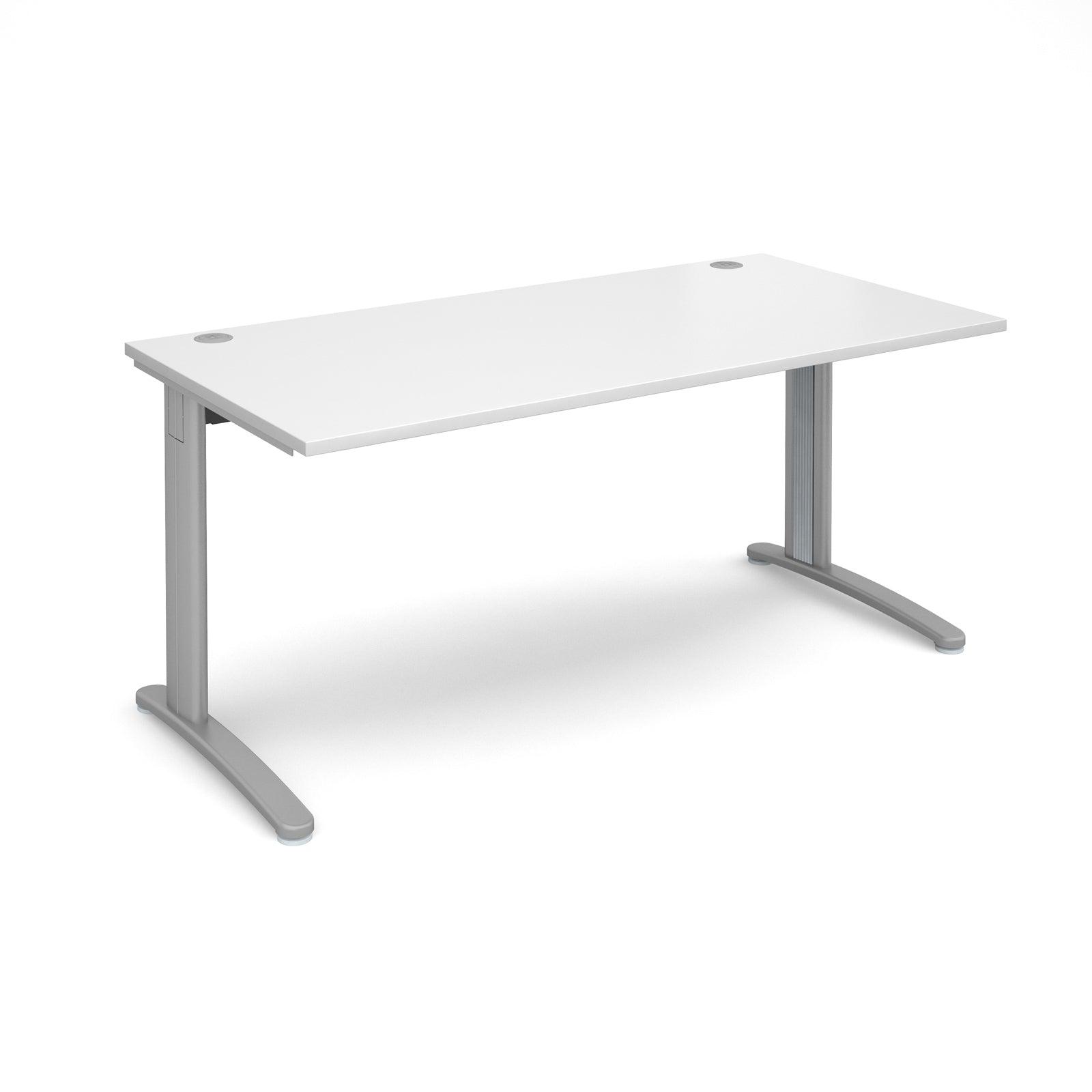 a white desk with a silver frame