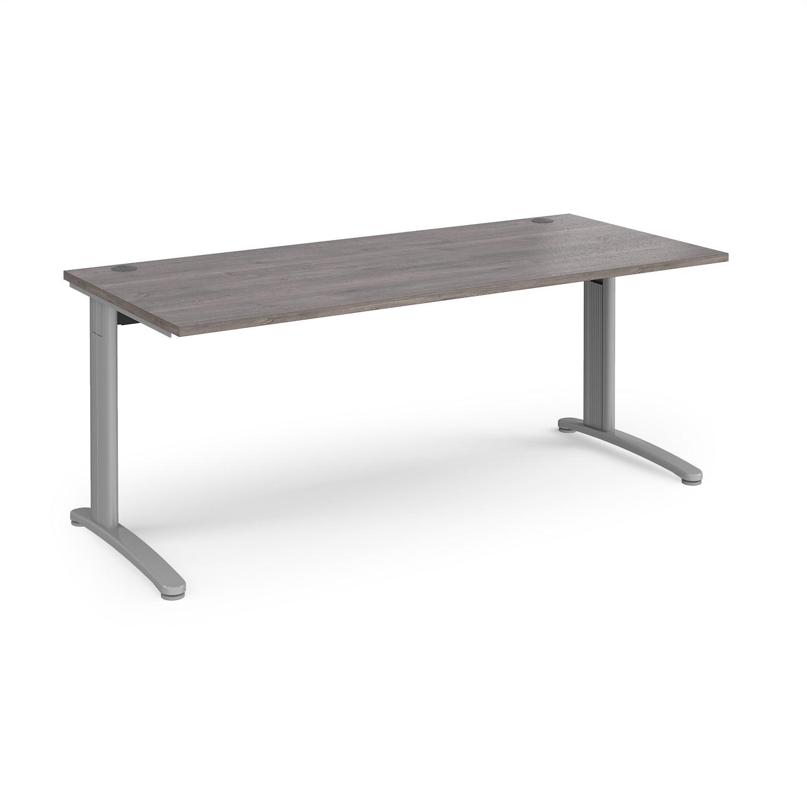 a rectangular table with a steel frame base