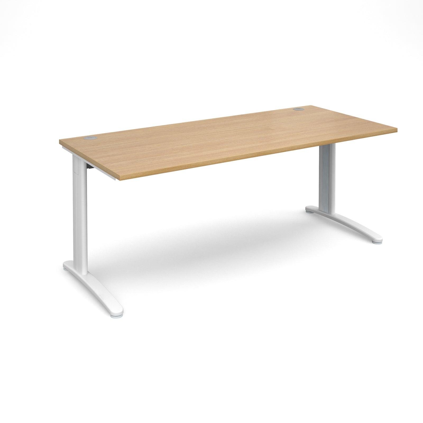 a desk with a wooden top and white legs