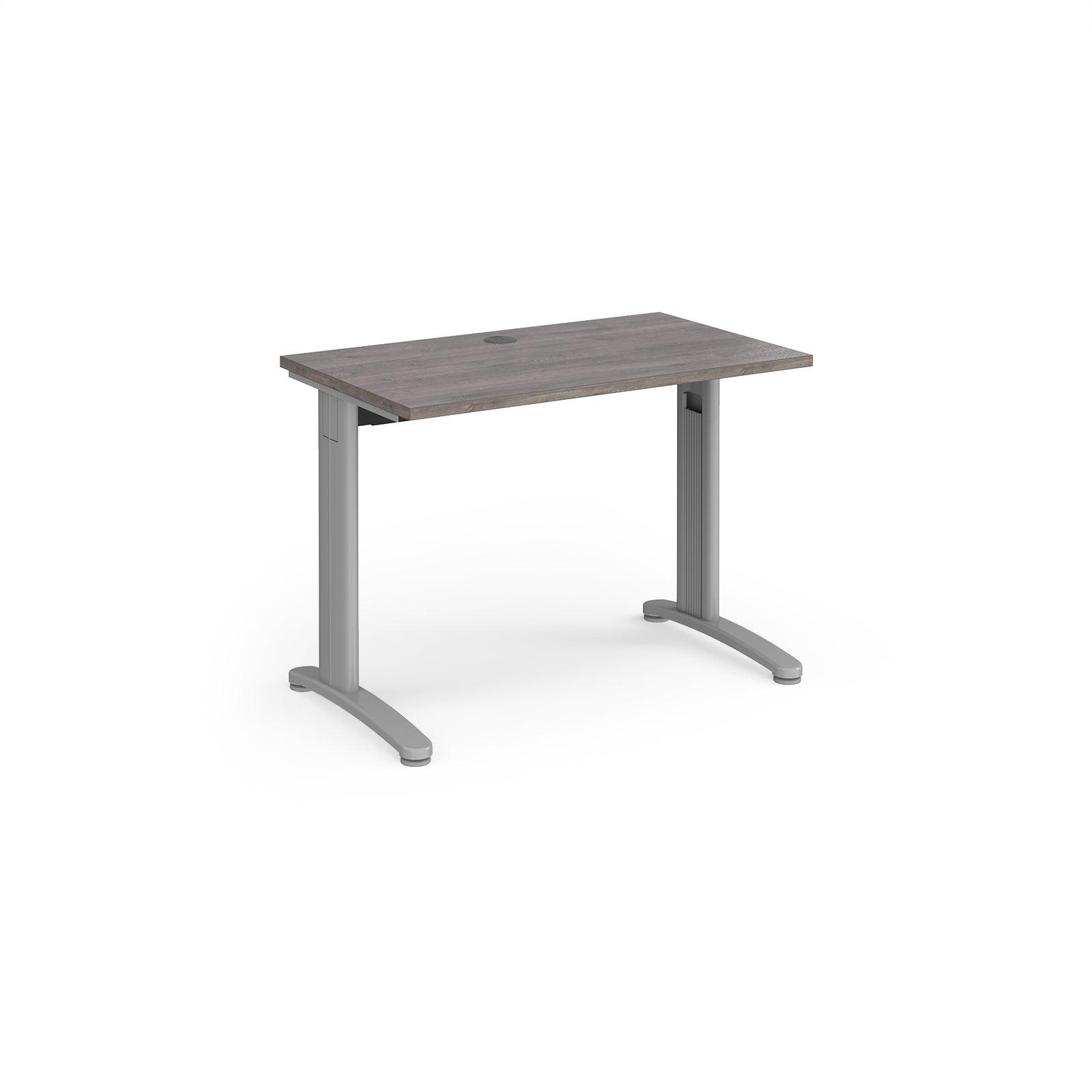 a desk with a wooden top and metal legs