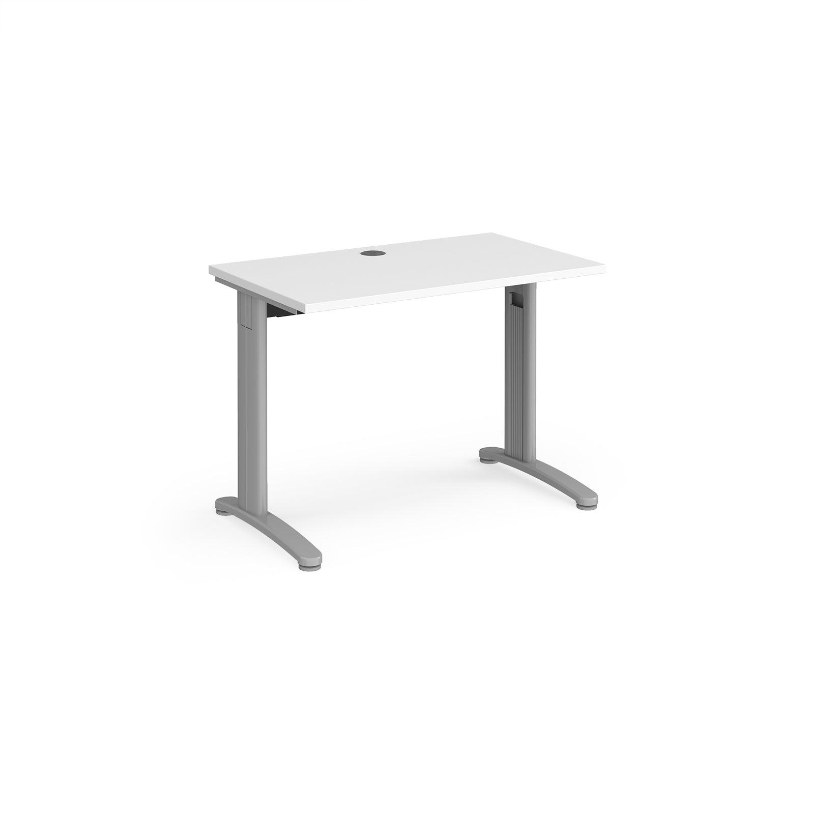 a desk with a white top and silver legs