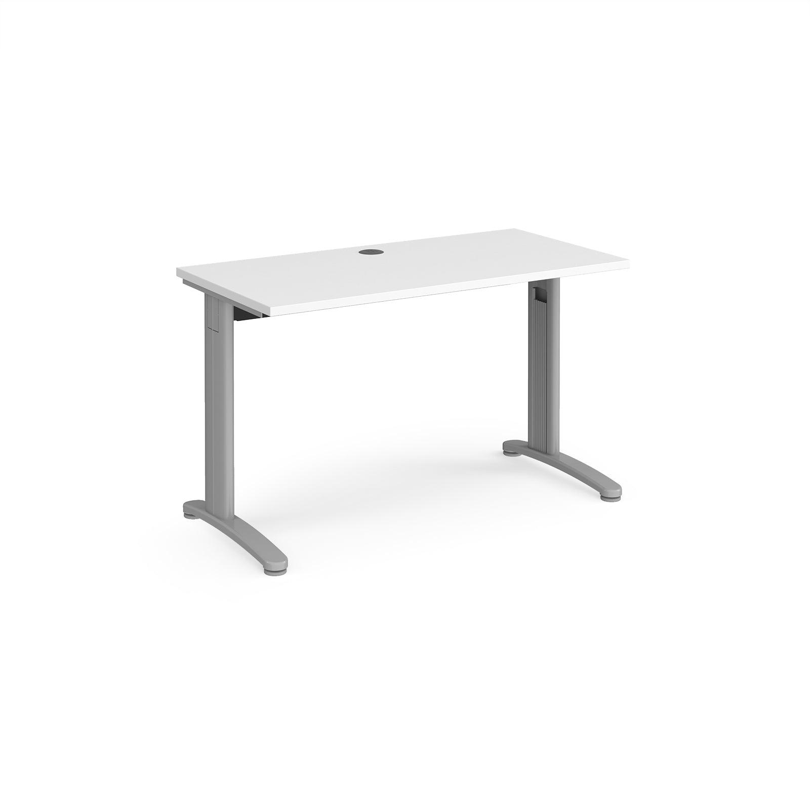 a white desk with a silver base