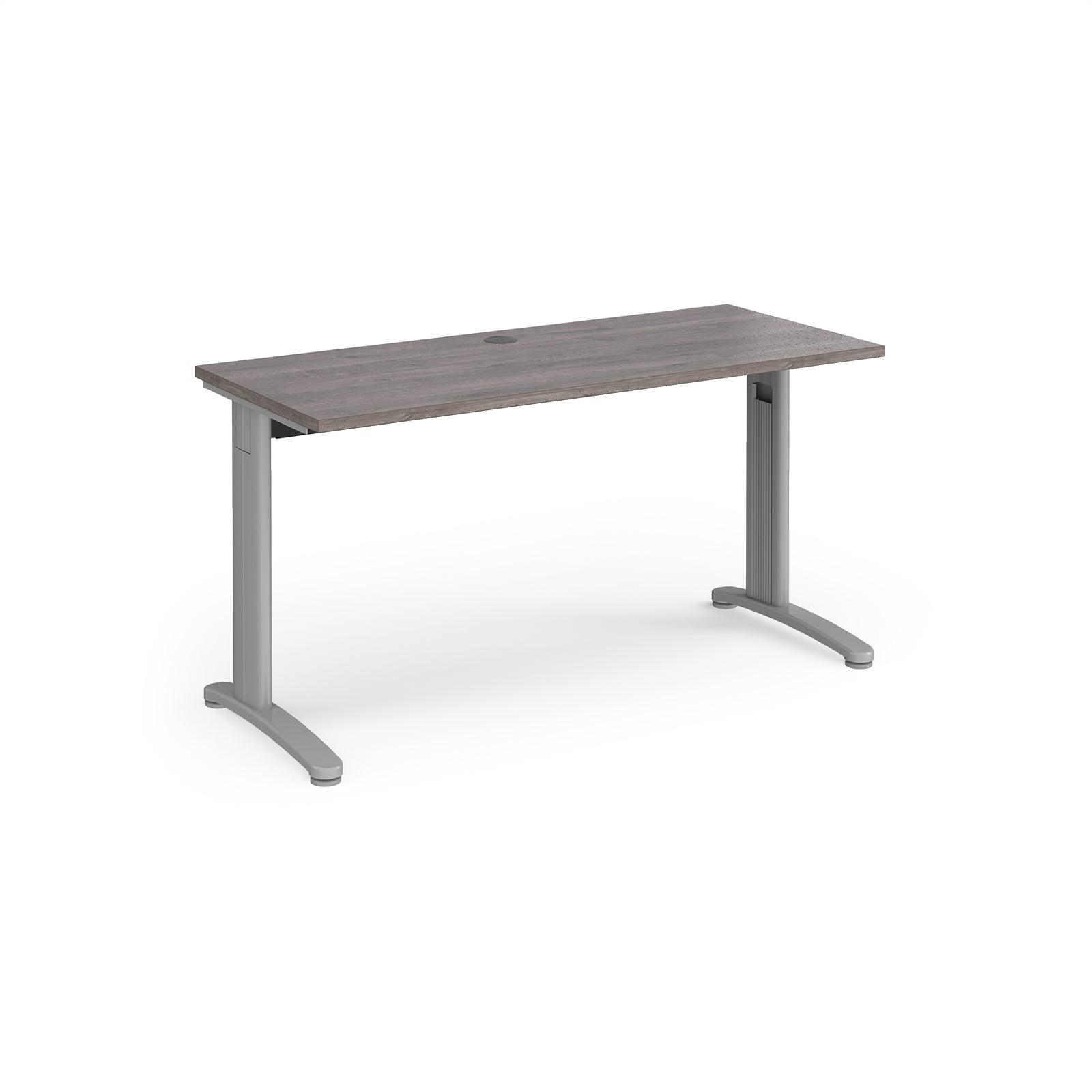 a desk with a grey top and silver legs