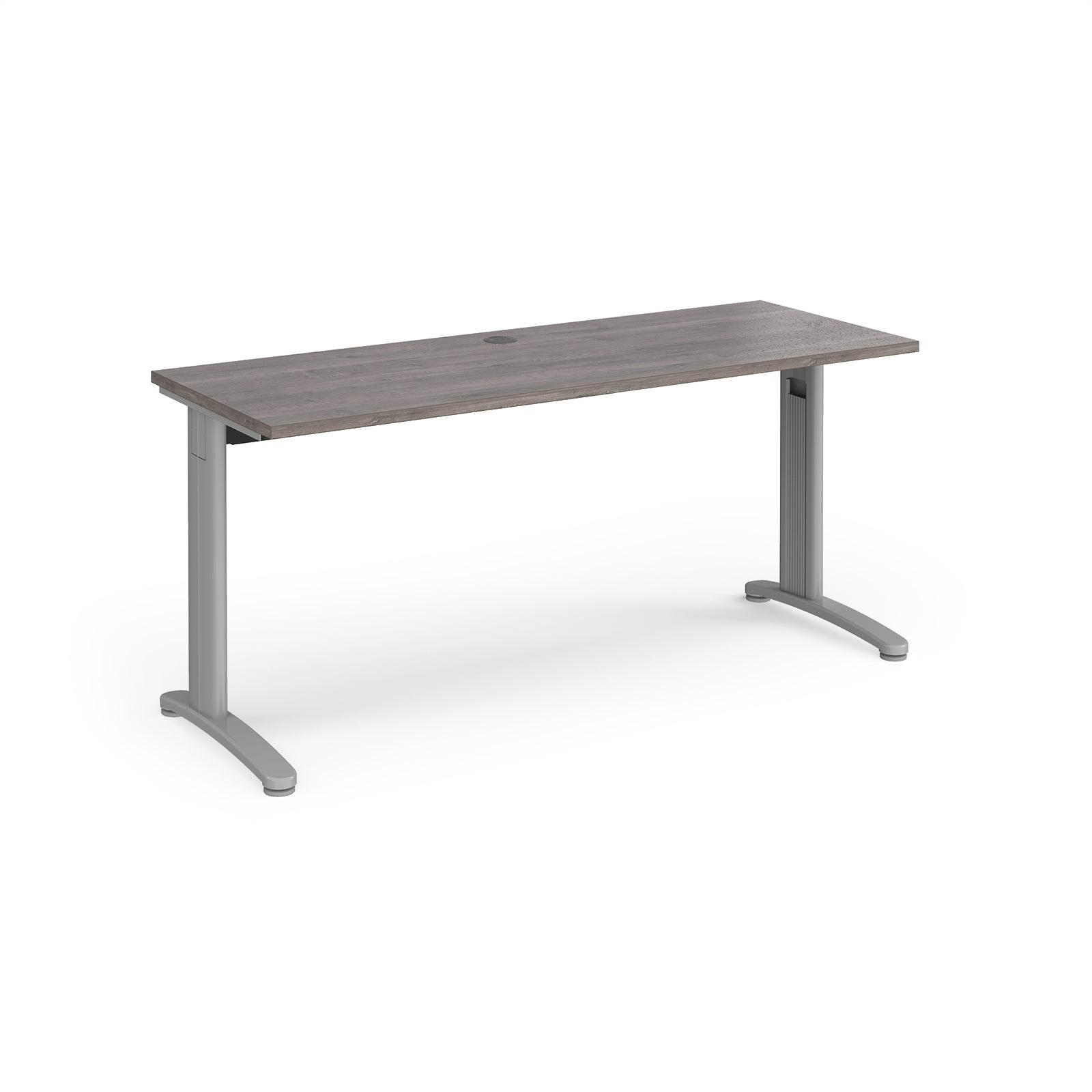 a desk with a gray top and silver legs