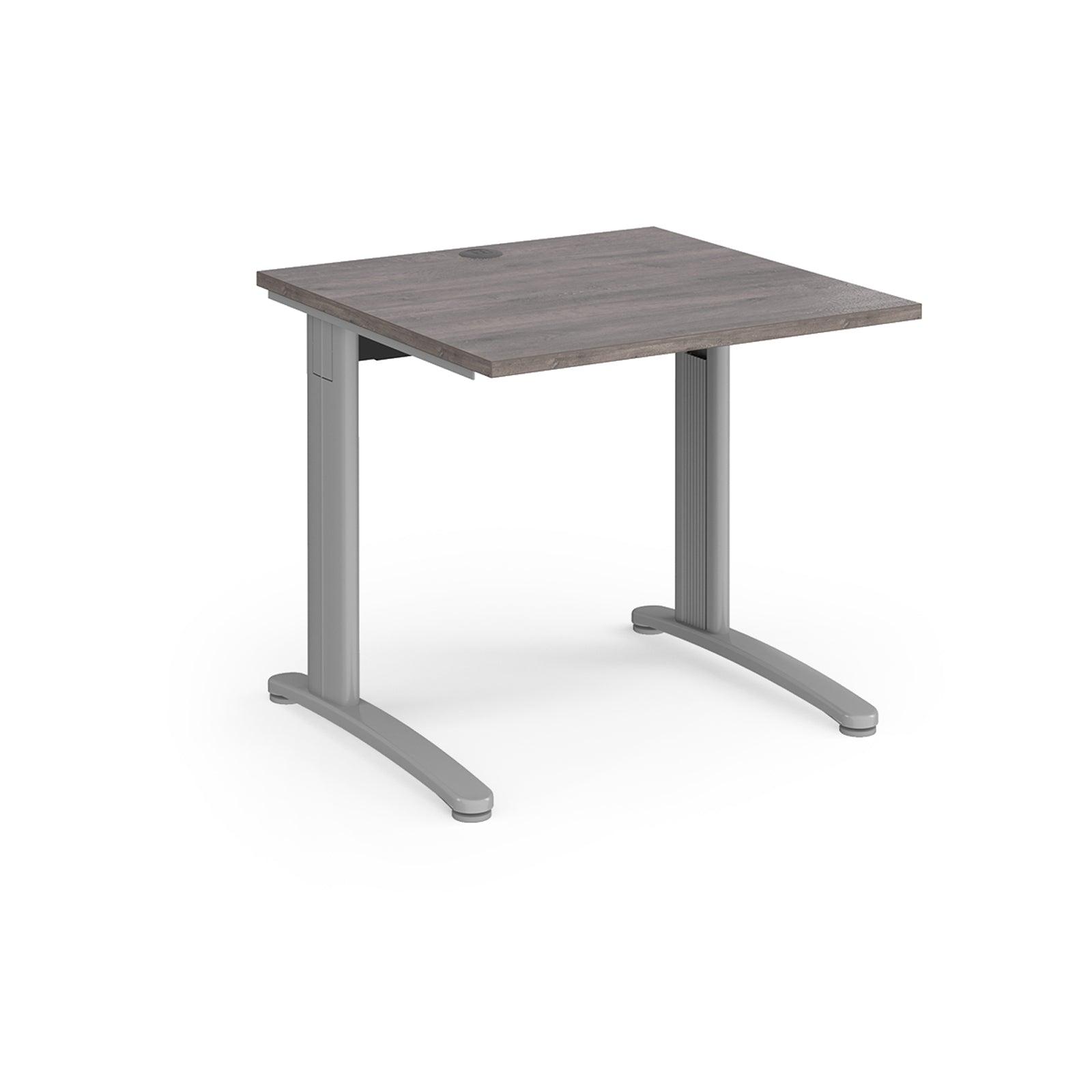 a desk with a wooden top and metal legs