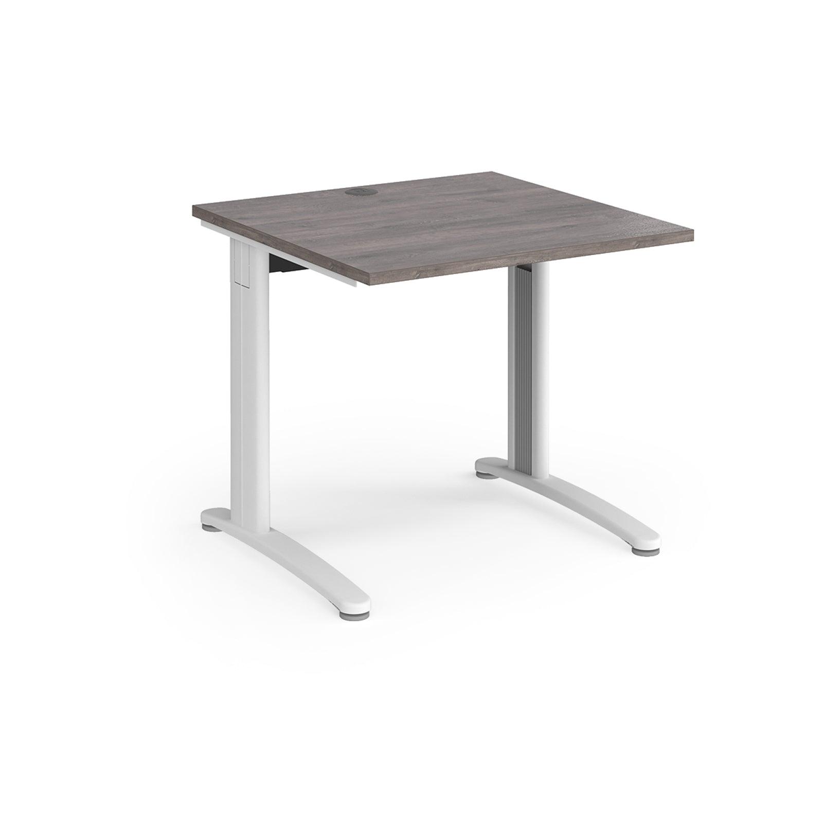 a desk with a wooden top and white legs