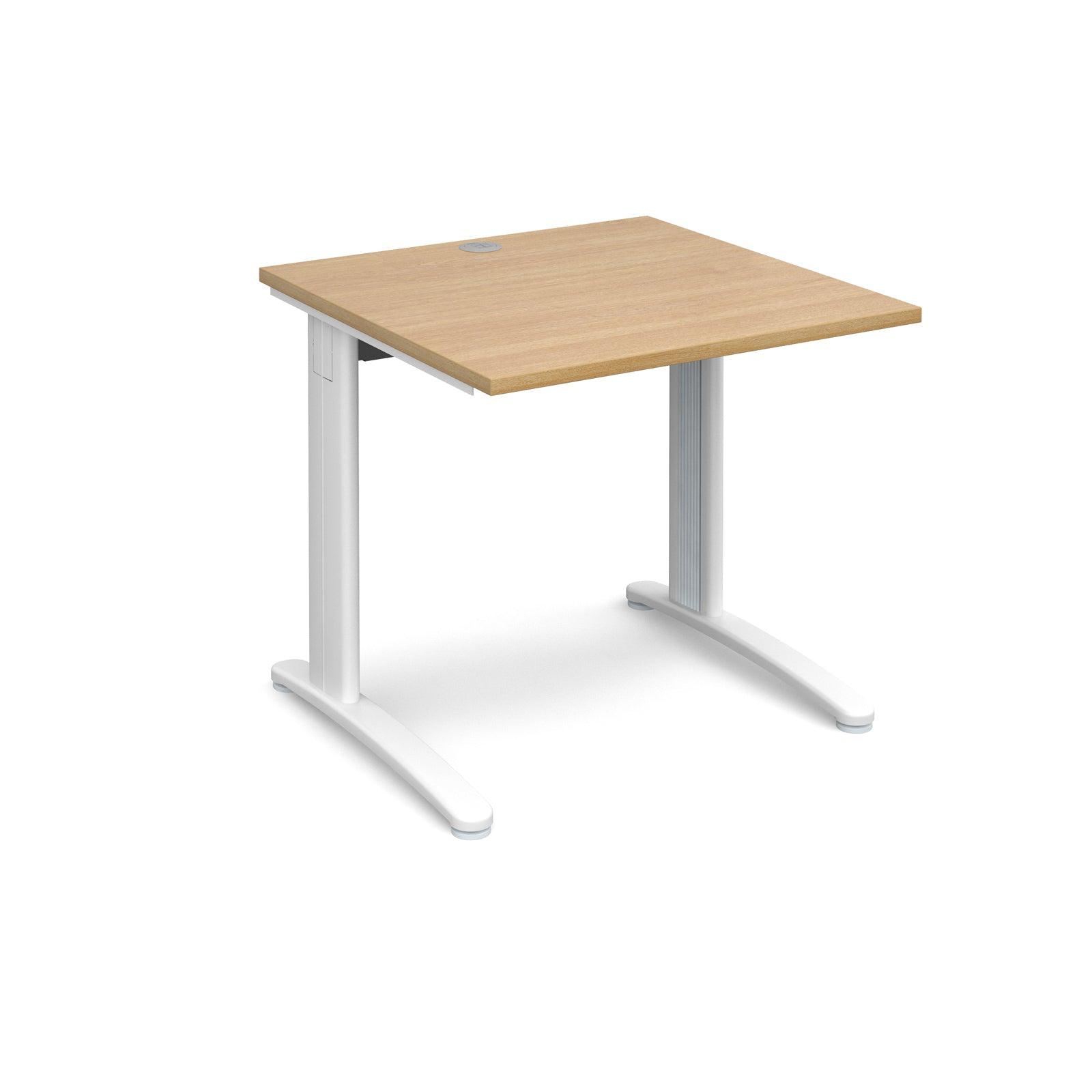 a desk with a wooden top and white legs