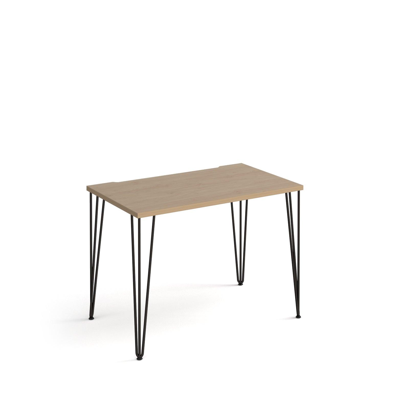 a table with hairpin legs and a wooden top