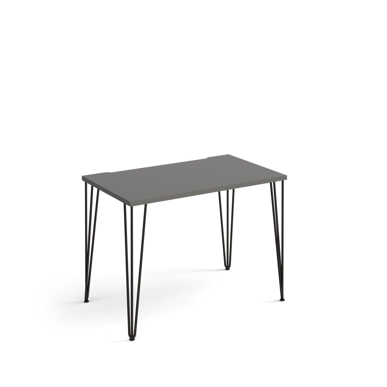 a black table with hairpin legs on a white background