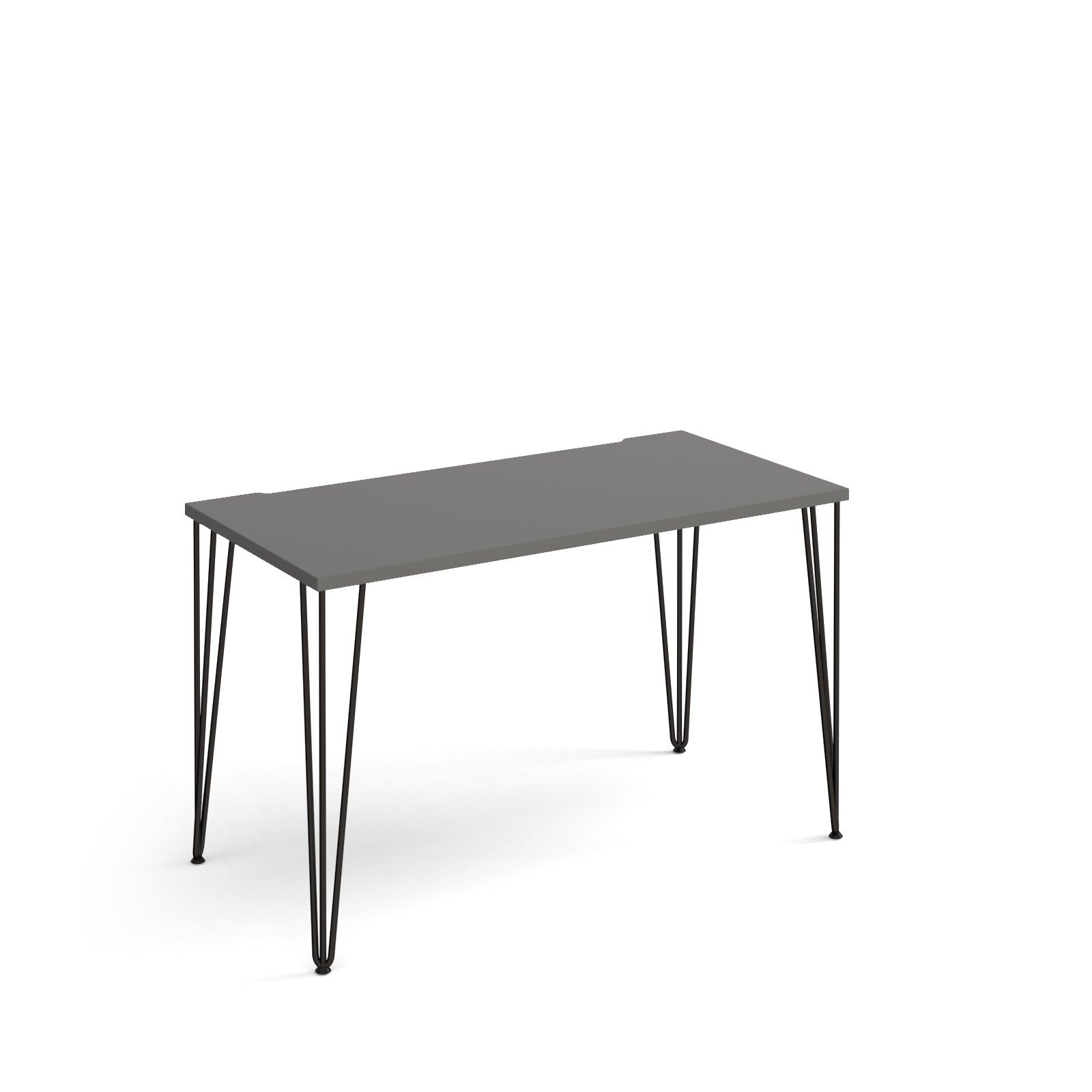 a black table with hairpin legs on a white background